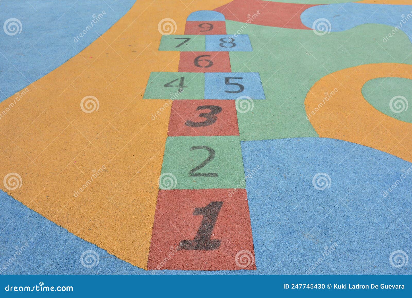 colorful hopscotch made on the floor of a playground