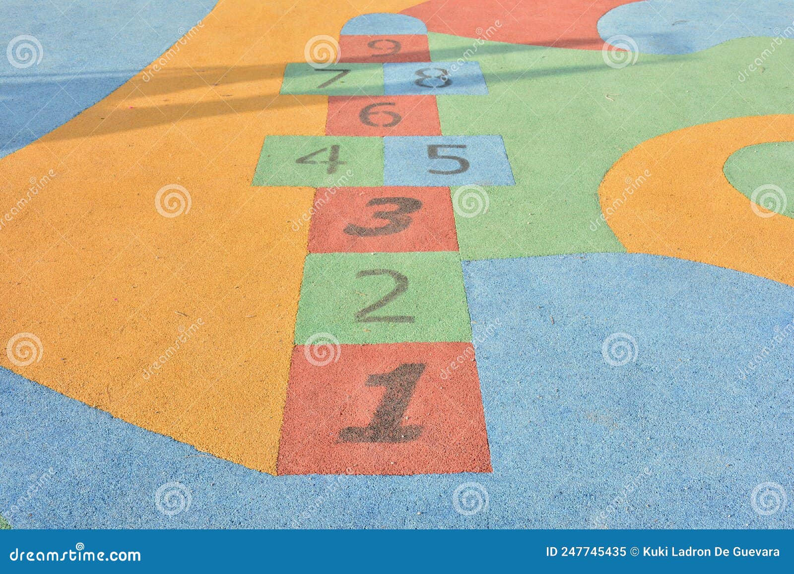 colorful hopscotch made on the floor of a playground
