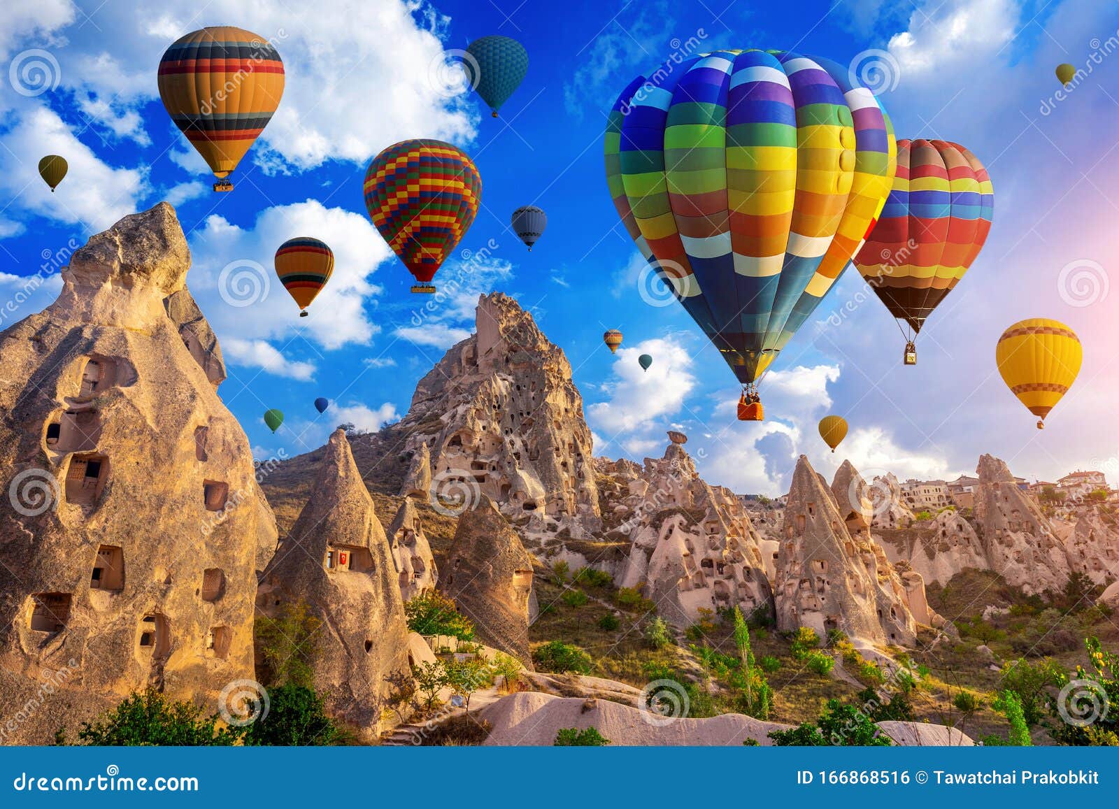 colorful hot air balloon flying over cappadocia, turkey.