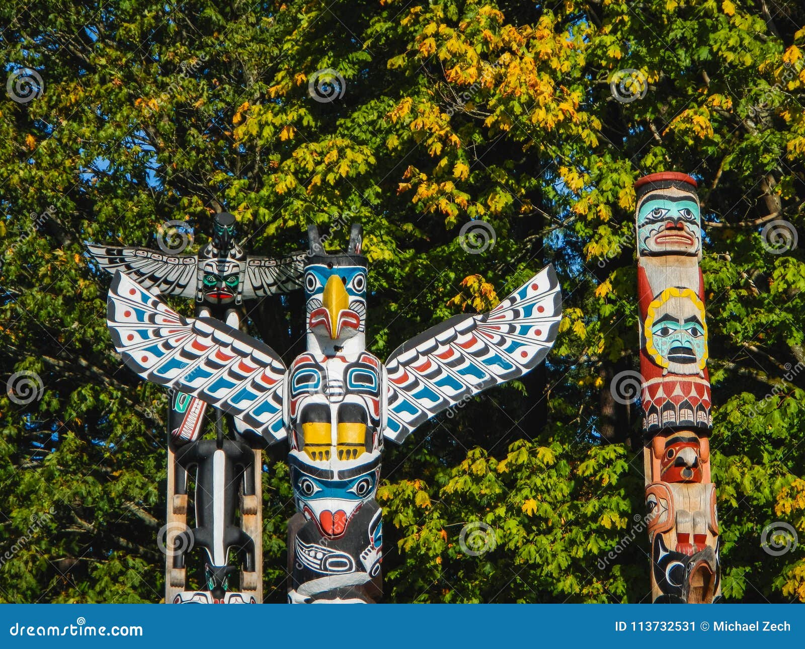 colorful totems in stanley park vancouver canada
