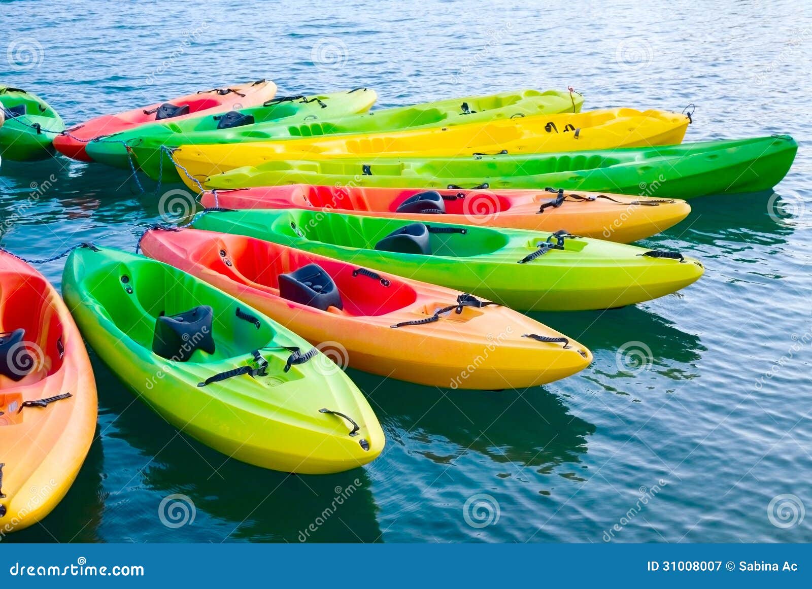 Colorful Kayaks On Water Royalty Free Stock Photography 