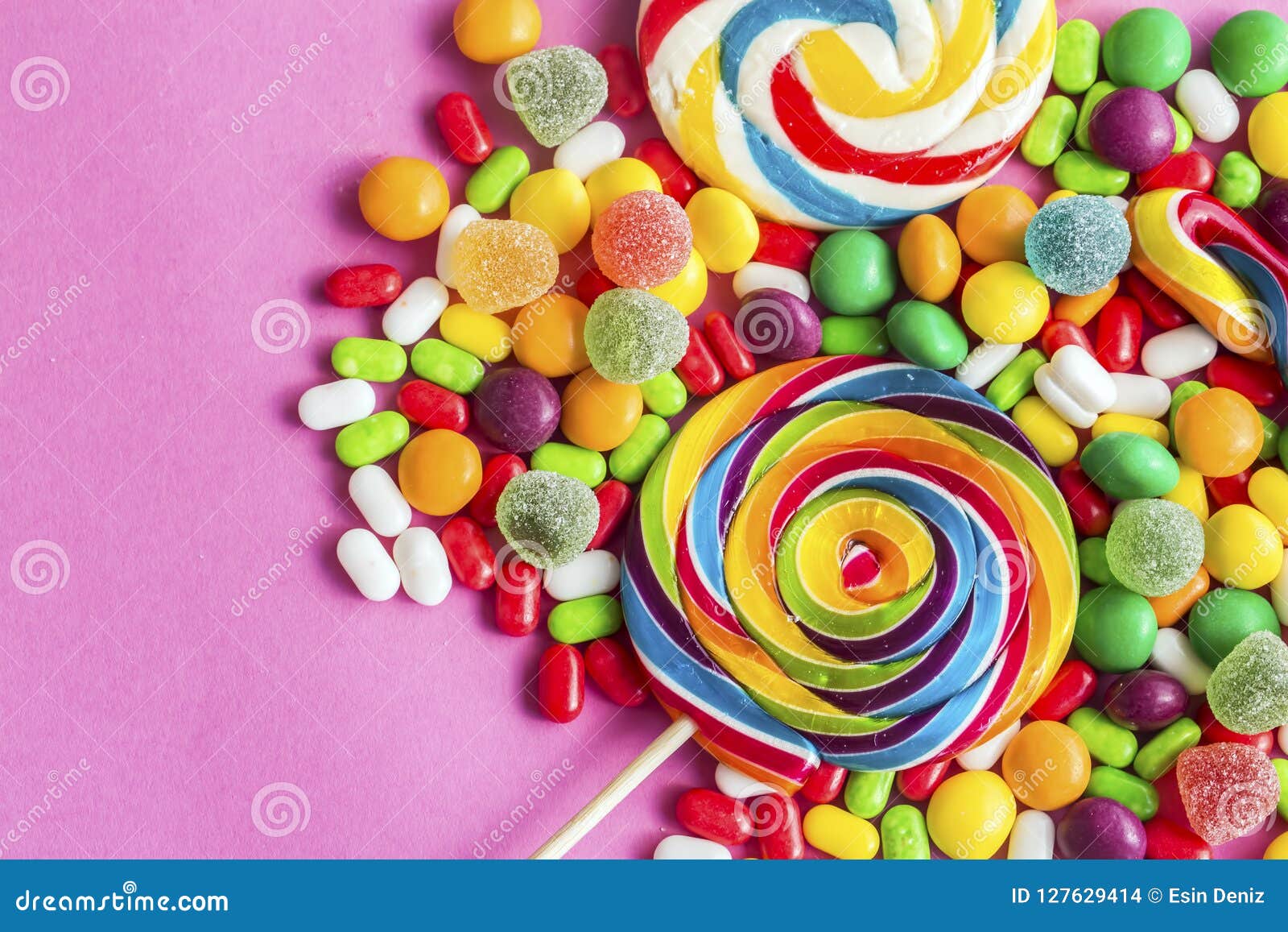 Colorful Lollipops And Different Colored Round Candy Stock Photo