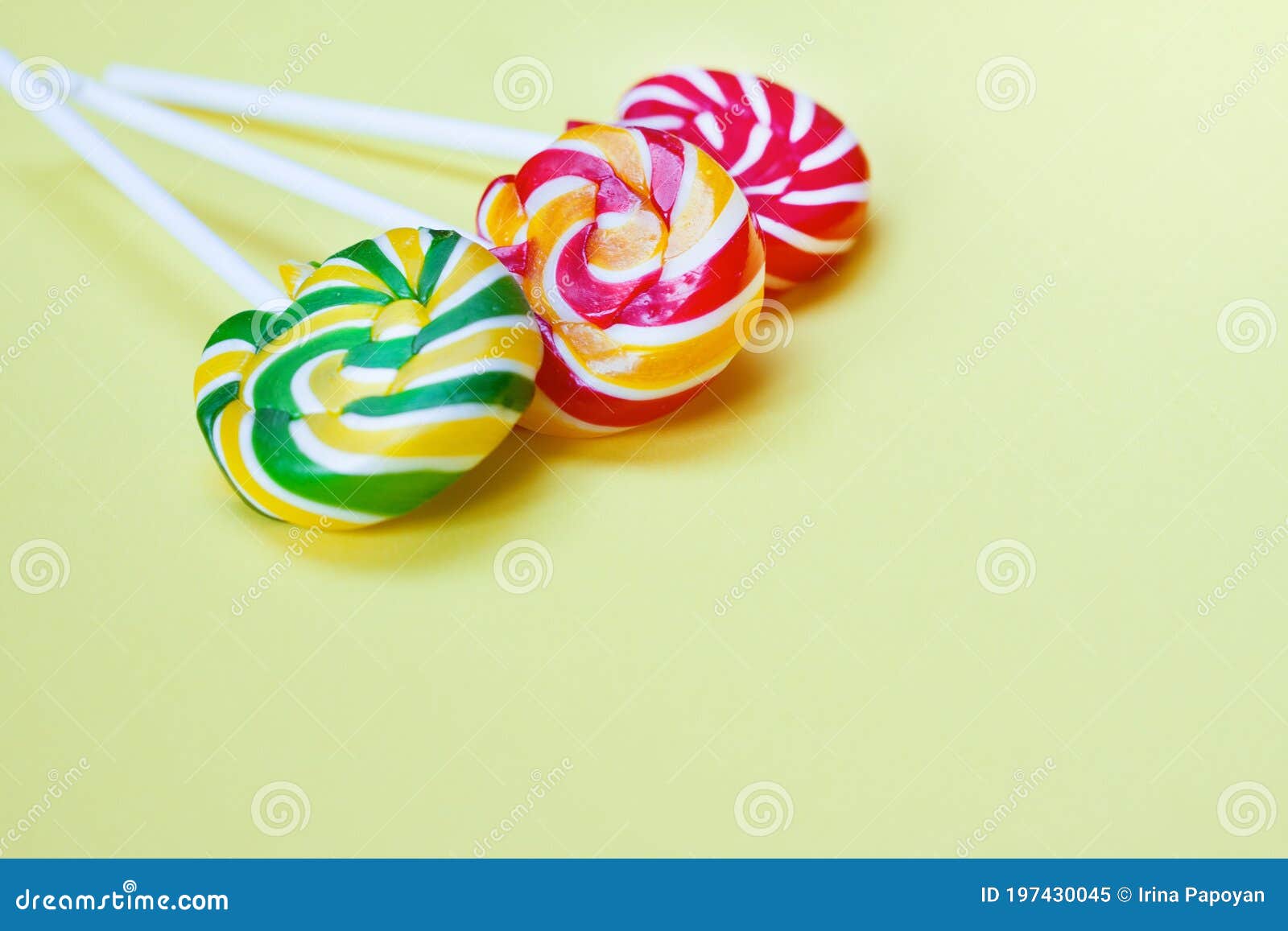 Colorful Lollipops on Yellow Background. Sweets for Party Stock Image ...