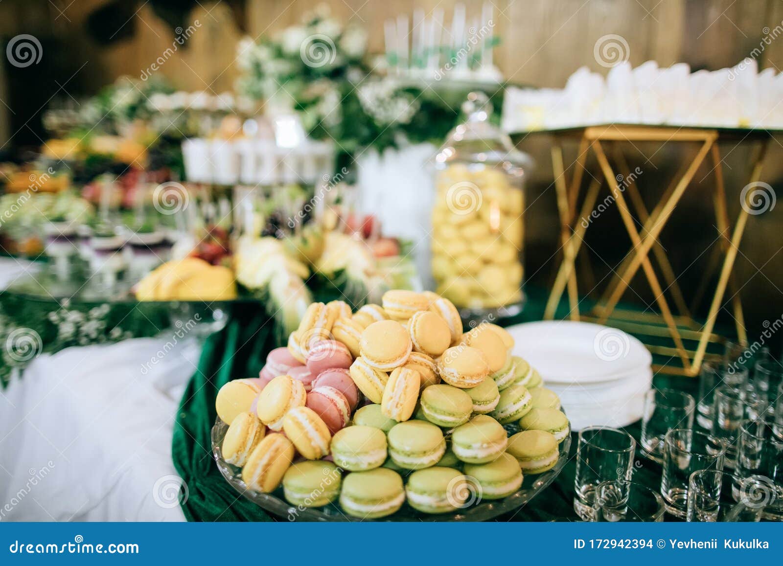 colorful macaroons  at dessert table at wedding party.  sweet food