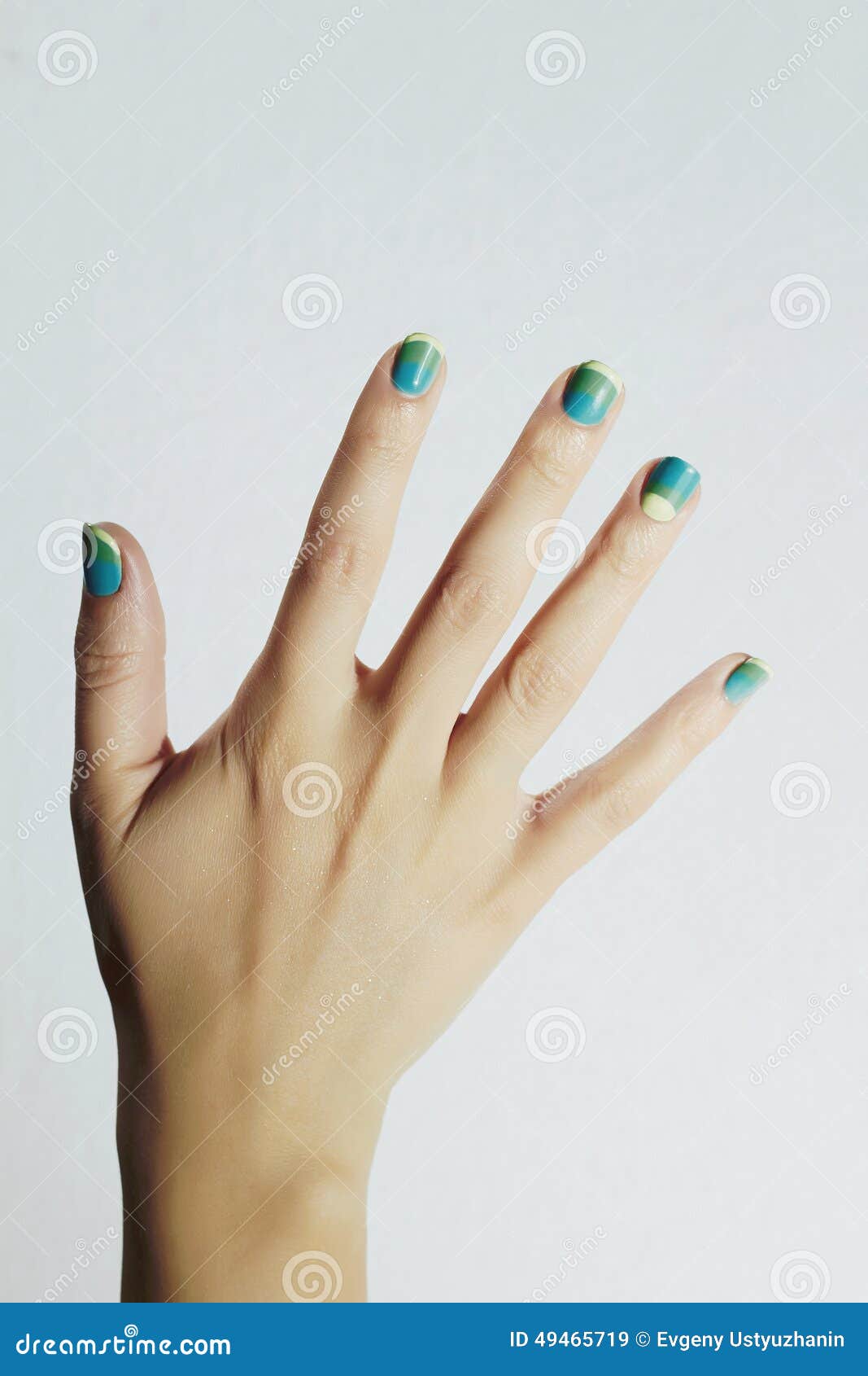 colorful manicure.female hands.beauty salon woman.shellac polish.nail 