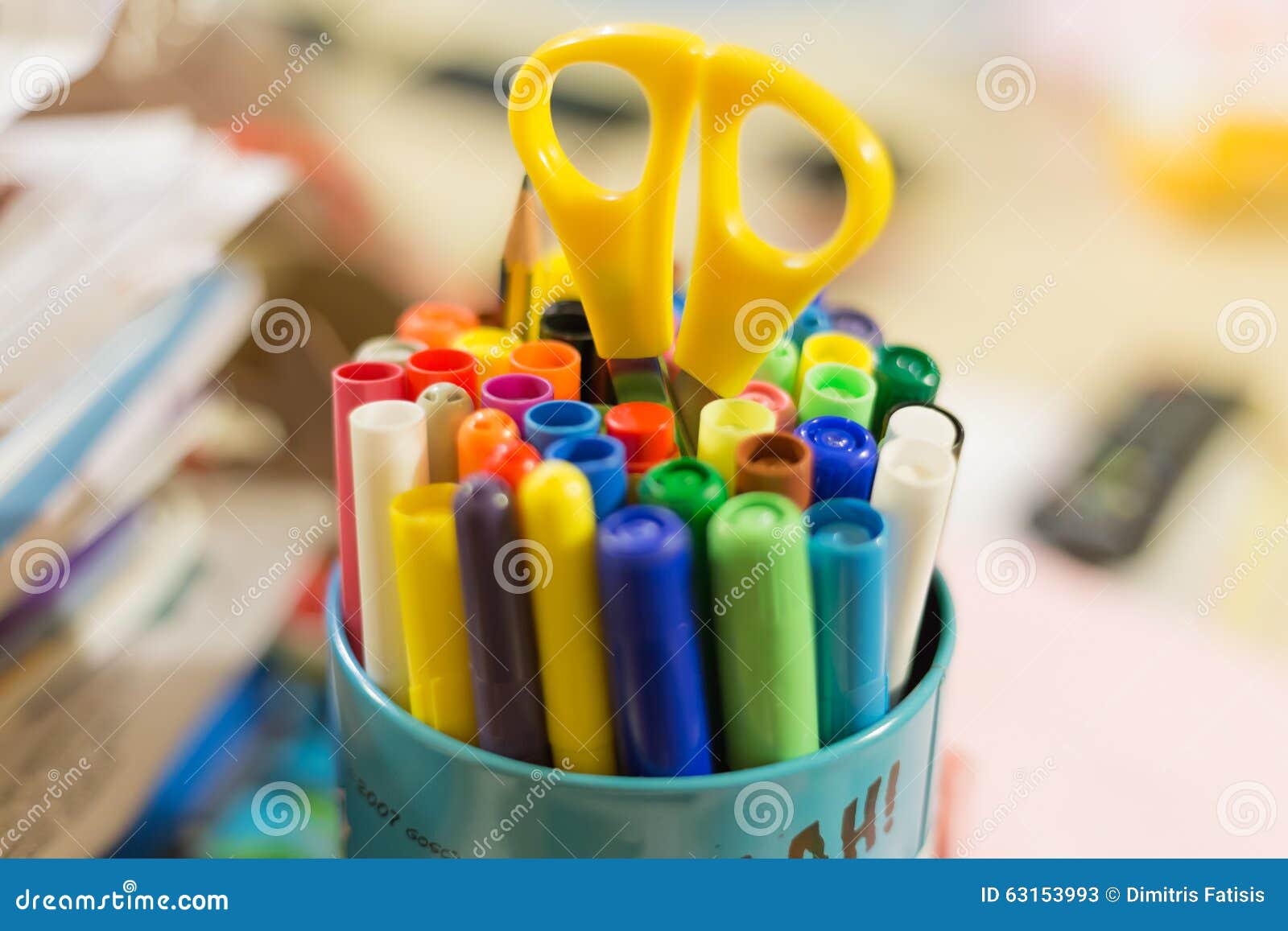 Colorful Crayons, Colored Pencils, Markers, Pens And Scissors In A Green  Box On A Desk Stock Photo, Picture and Royalty Free Image. Image 5247060.