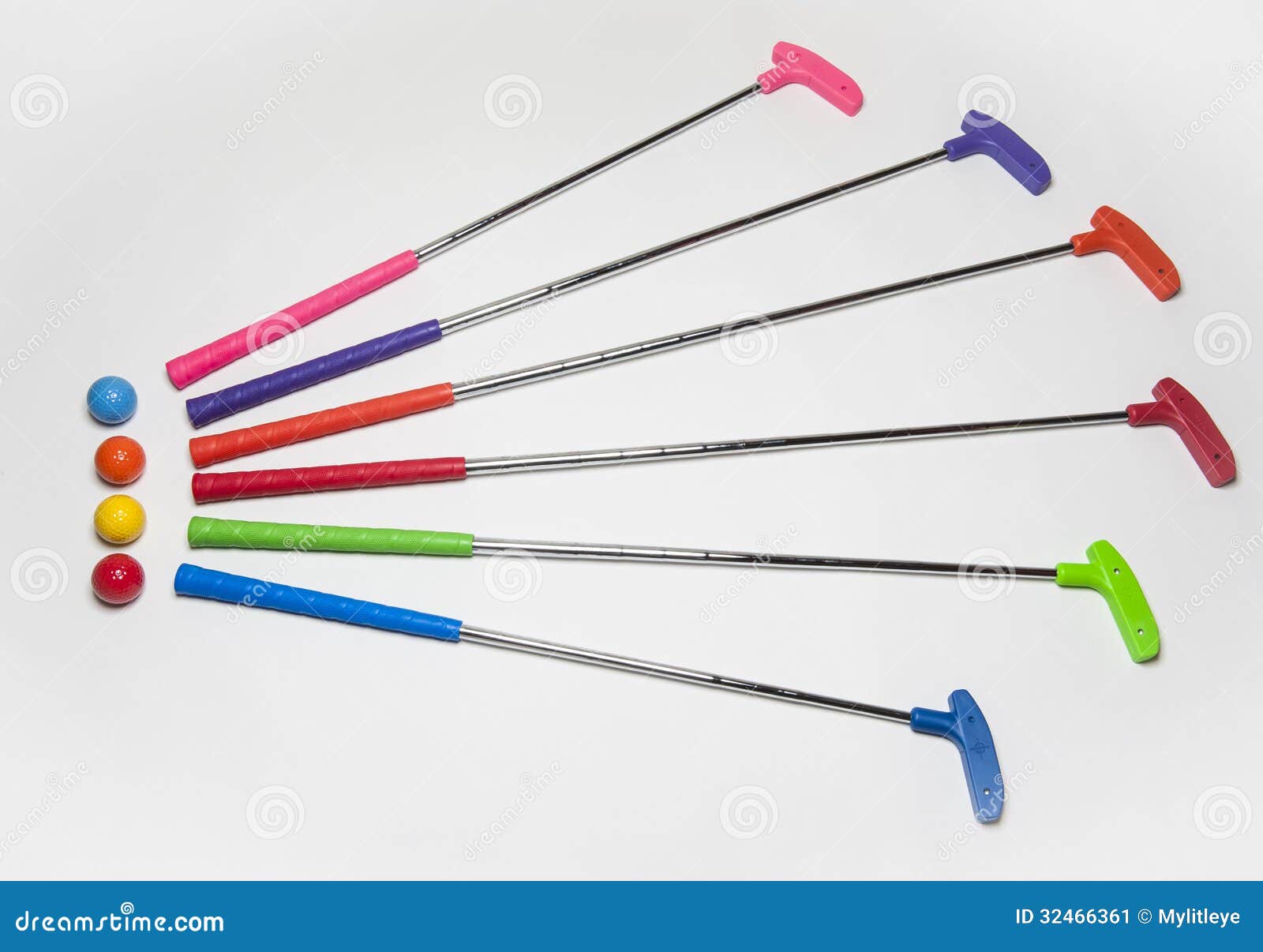 colorful mini golf clubs and balls