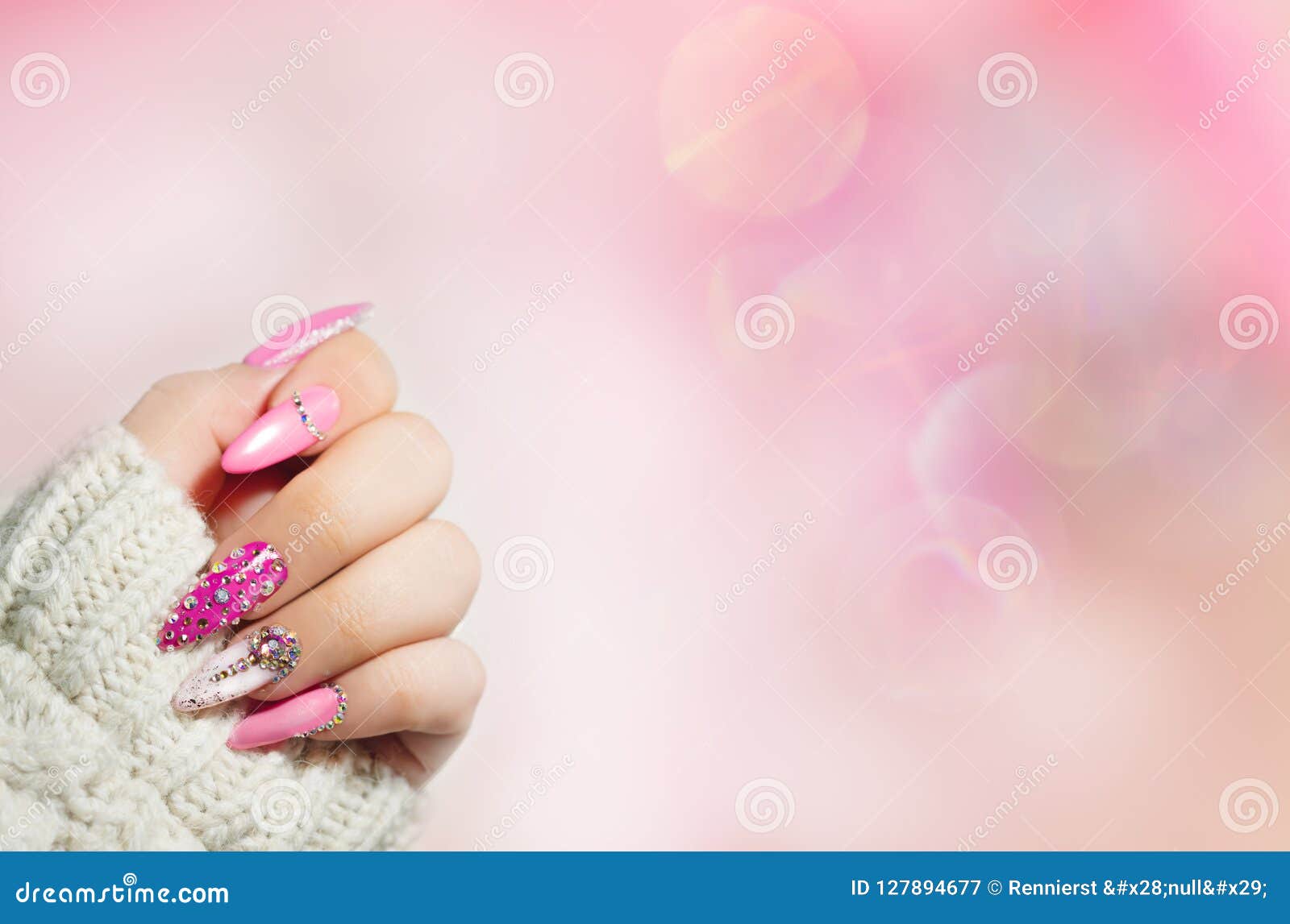 Golden manicure with gems and sparkles. Stock Photo by ©Subbotina 100196828