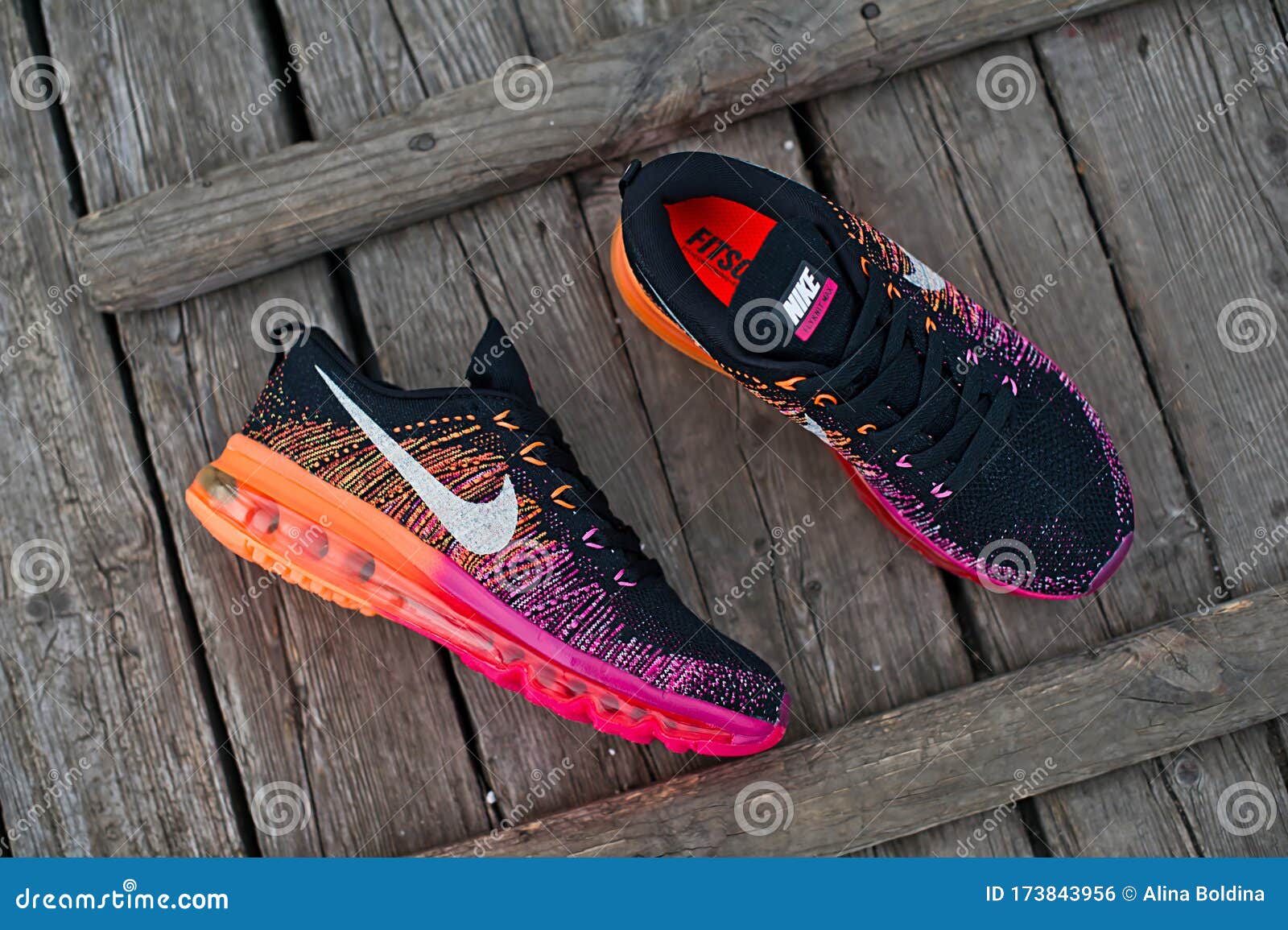 Colorful Flyknit Air Max Running Shoes, Sneakers on Wooden Background. Krasnoyarsk, Russia - March 18, 2015 Editorial Photo - Image of famous, 173843956