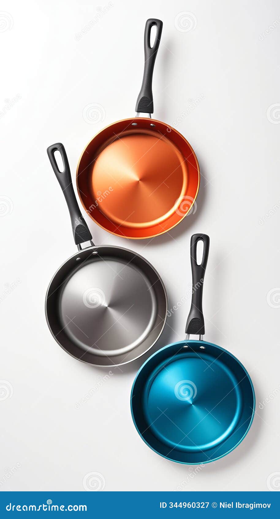 colorful non-stick frying pans set displayed against neutral background