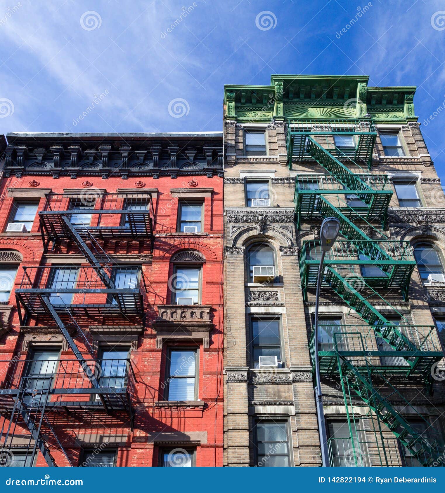 Colorful Old Historic Apartment Buildings with Fire Escapes in ...