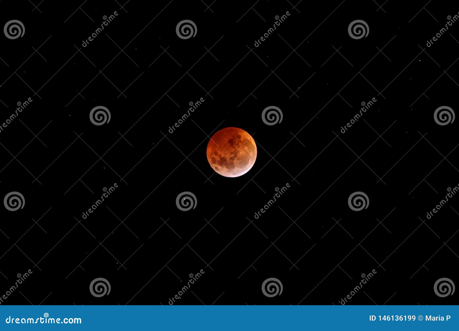 eclipse lunar red full moon in dark black sky at night