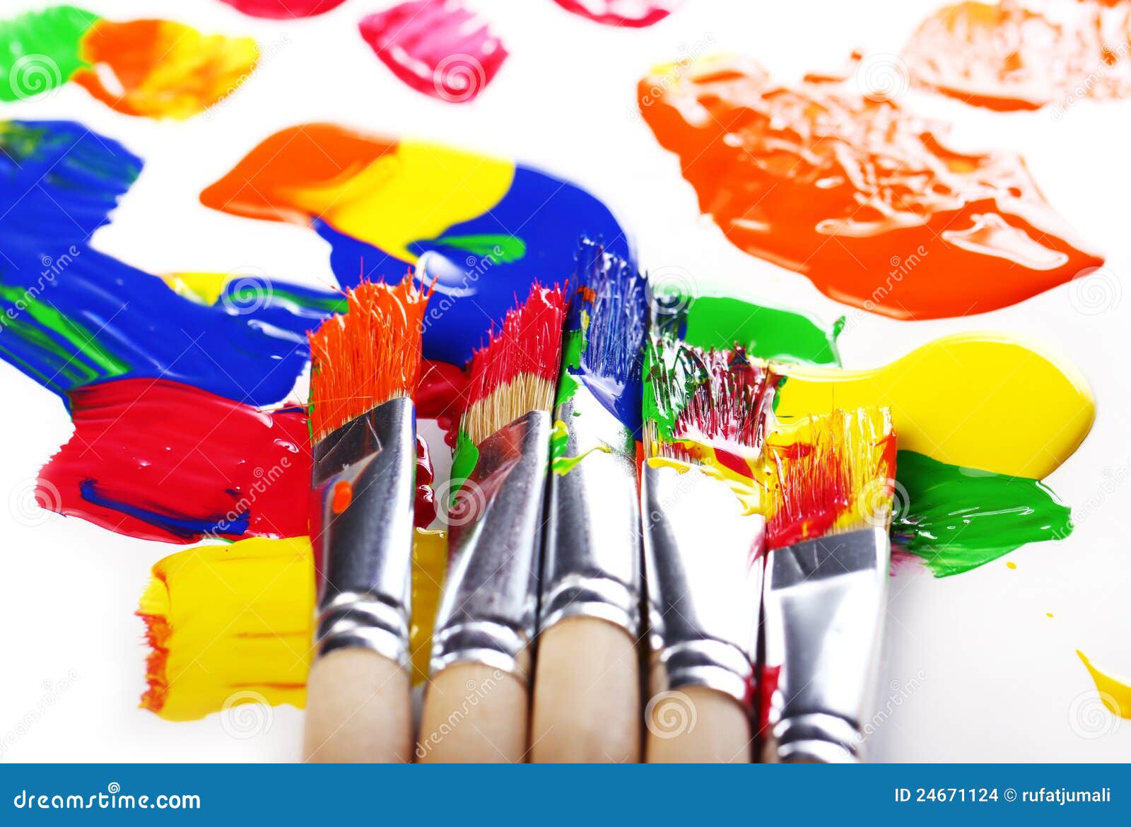 Colorful paint and brushes stock photo. Image of colorful - 24671124