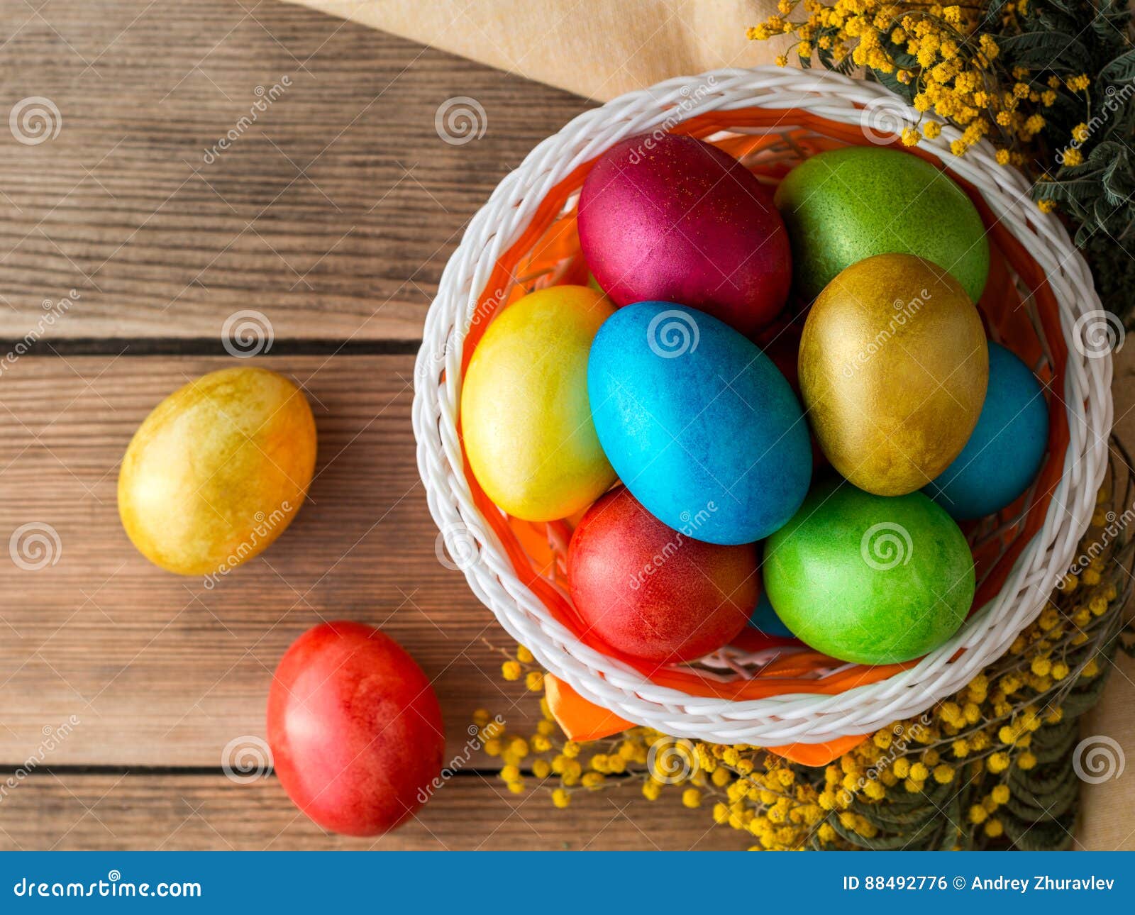Colorful Painted Easter Eggs in Basket and Mimosa Flowers on Rustic ...