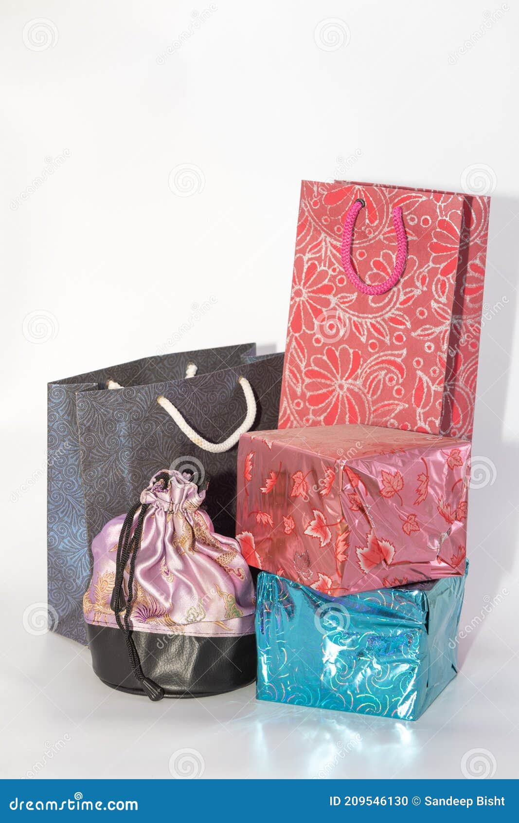 Colorful Paper Carry Bags and a Silk Cloth Pouch Stock Photo - Image of ...