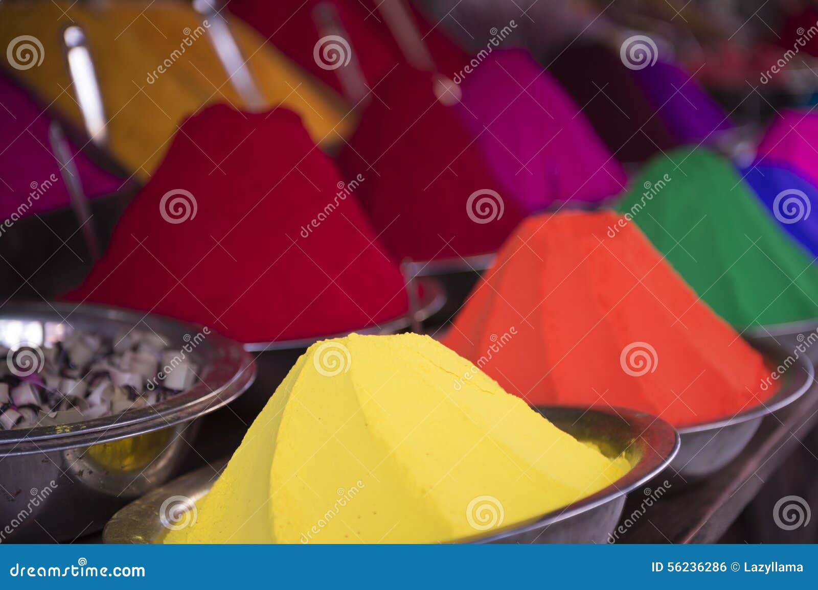 colorful piles of indian bindi powder at outdoor market