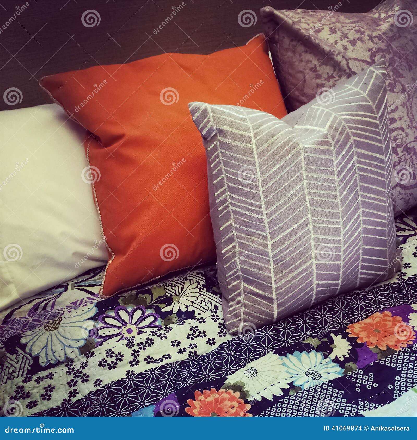 Colorful pillows on a bed stock photo. Image of sleep 41069874