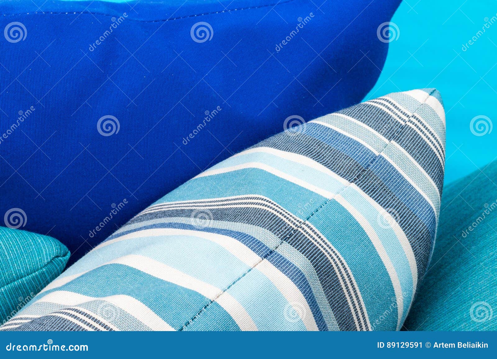 Colorful Pillows on a Blue Sofa. White, Blue, Dark Blue. Stock Image Image of decorative