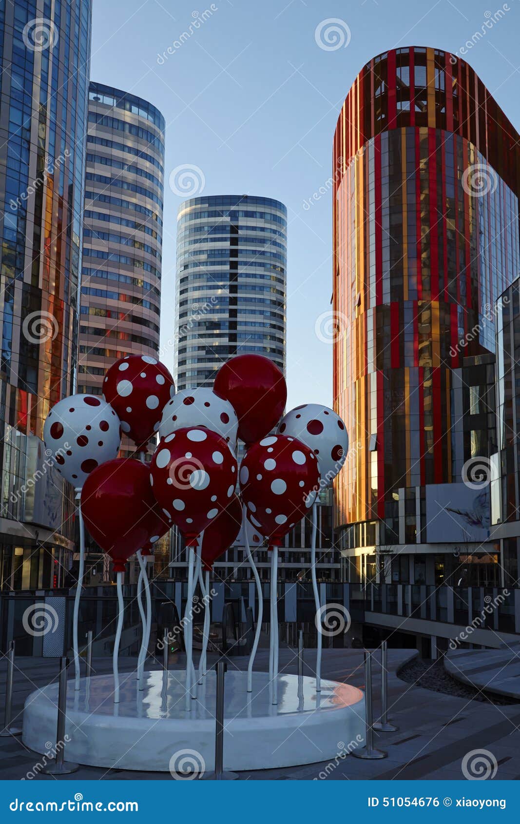 colorful plastic balloon s and office buildings