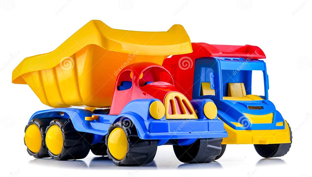 Colorful Plastic Dump Trucks Isolated on White Background Stock Photo