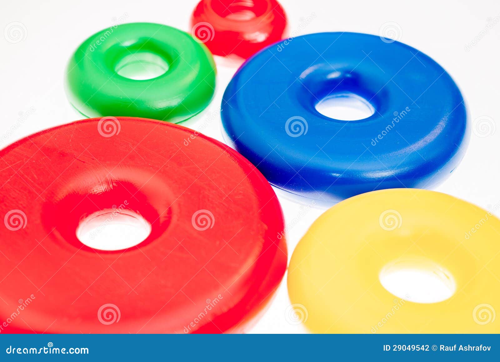 Colorful plastic toy rings stock photo. Image of education 29049542
