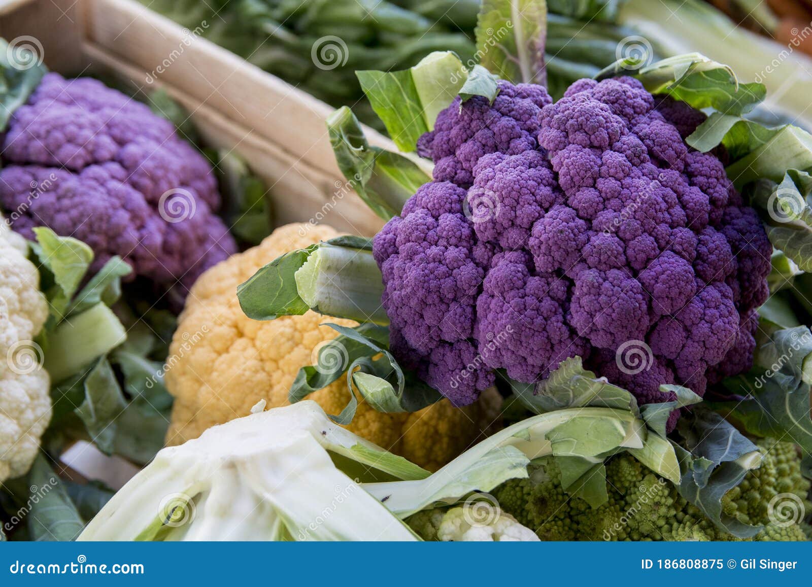 colorful purple and yellow cauliflowers in the market