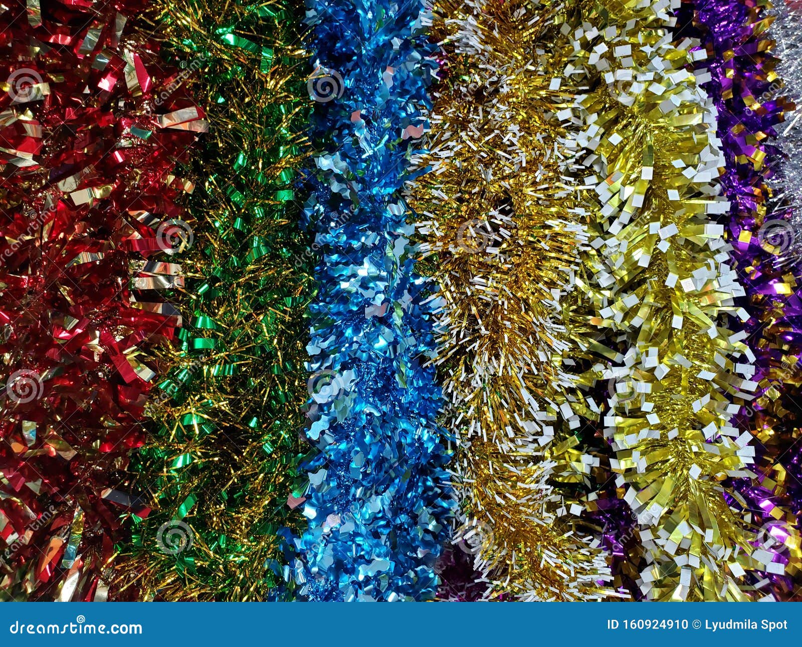 Colorful Red Green Blue and Yellow Tinsel Christmas Blurred Background ...