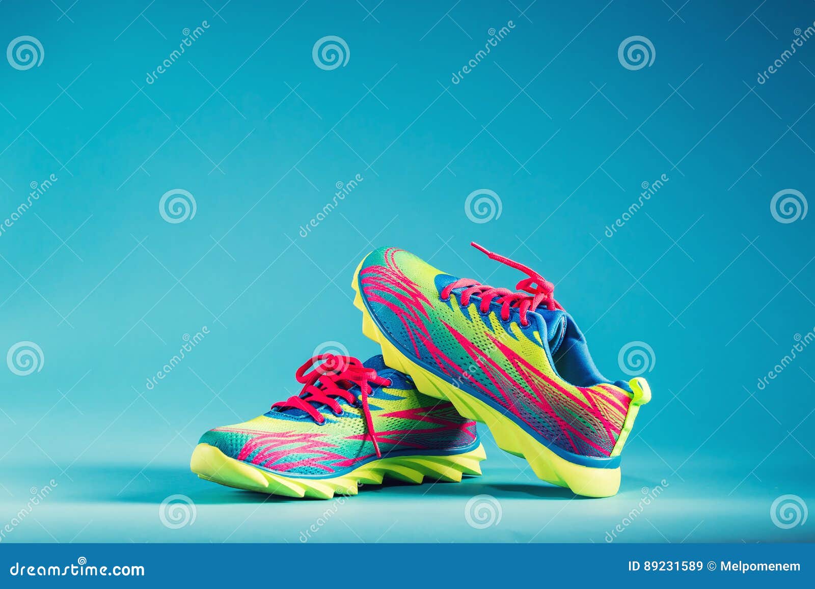 Colorful Running Sneakers on a Blue Background Stock Image - Image of ...