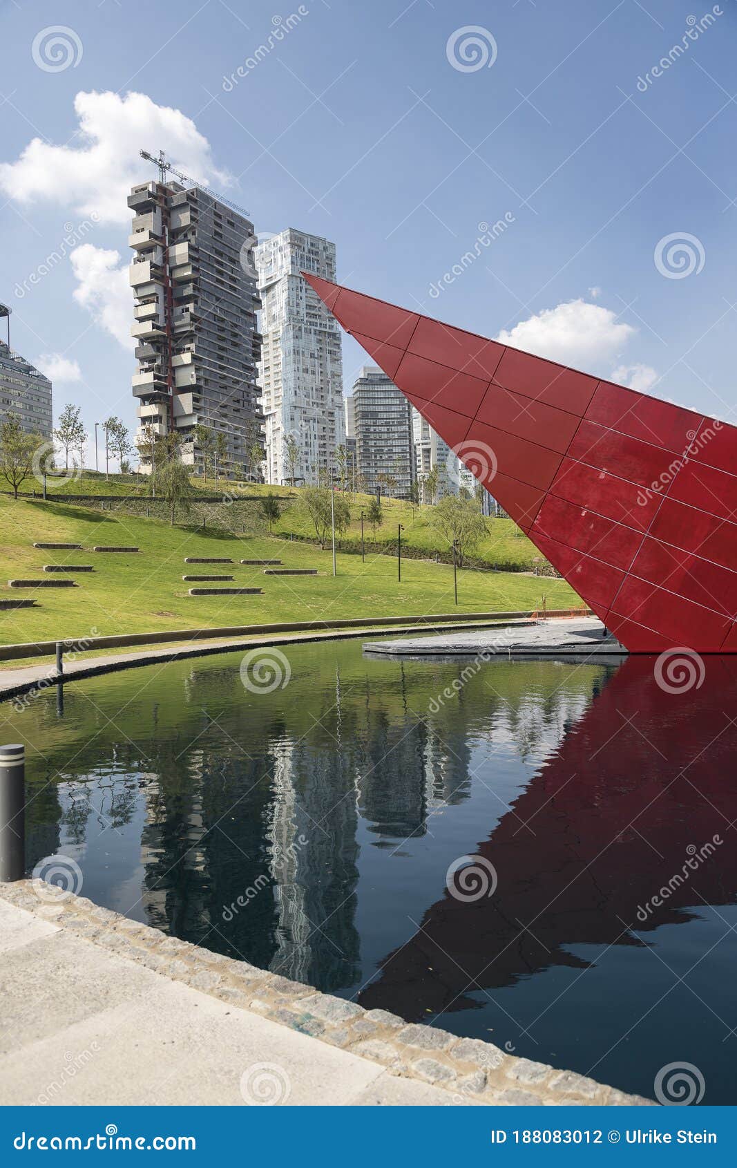 colorful scene of artificial lake and red auditorium