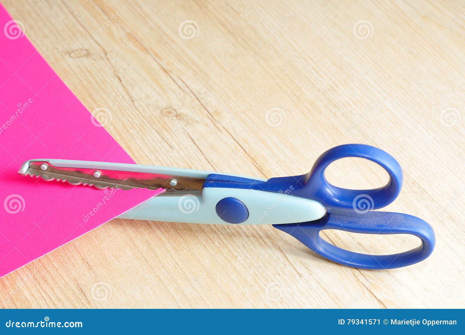 Colorful Scissor That Cut A Zigzag Pattern Stock Photo - Download
