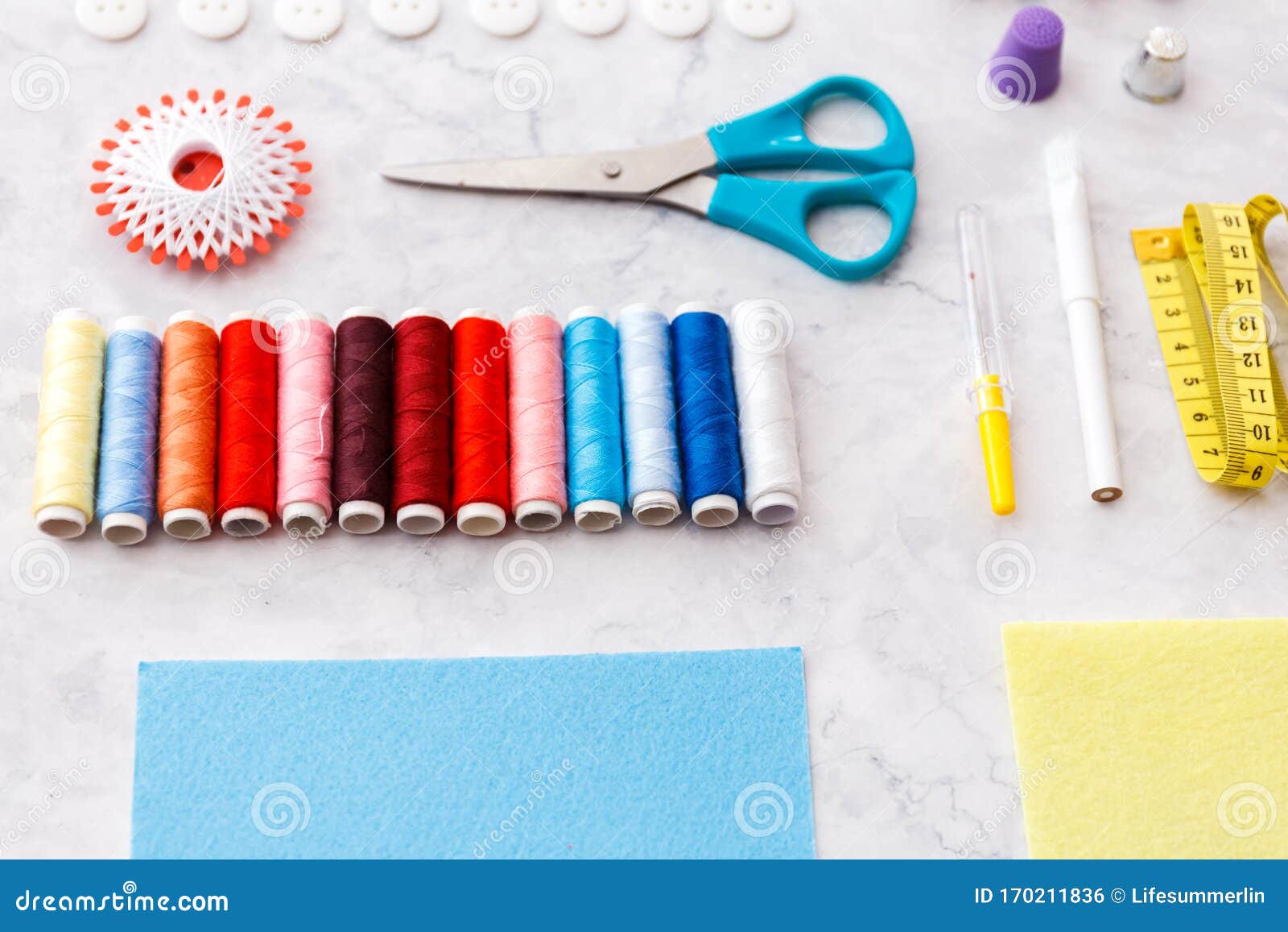 Colorful Sewing and Tailoring Tools and Items on Light Background Stock ...