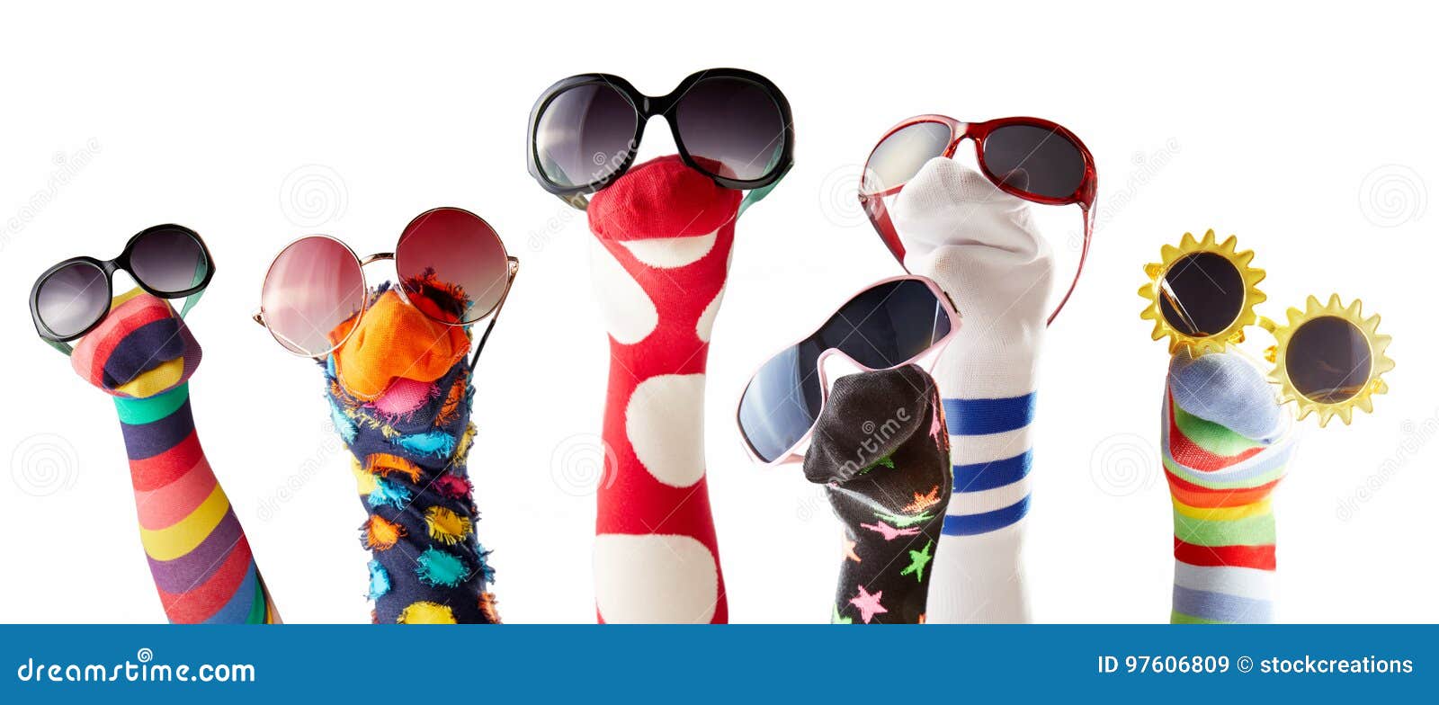 sock puppets with glasses against white background