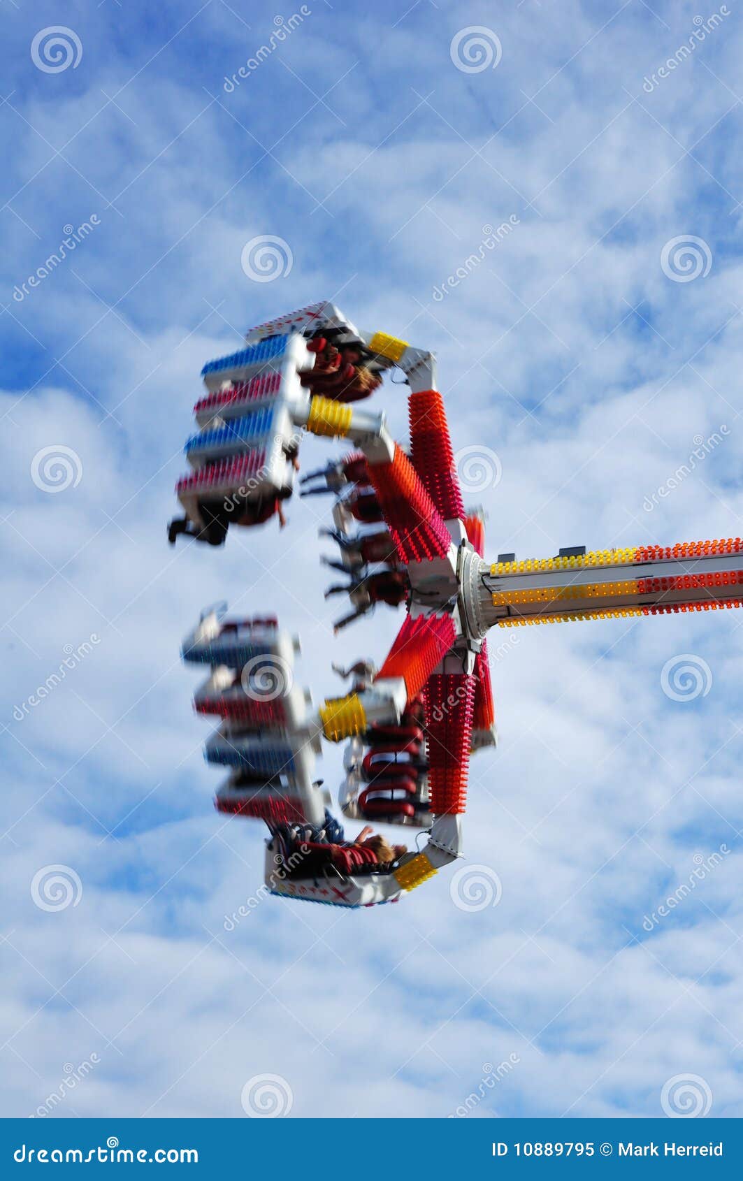 Colorful Spinning Carnival Ride Stock Image Image of clouds, outdoors