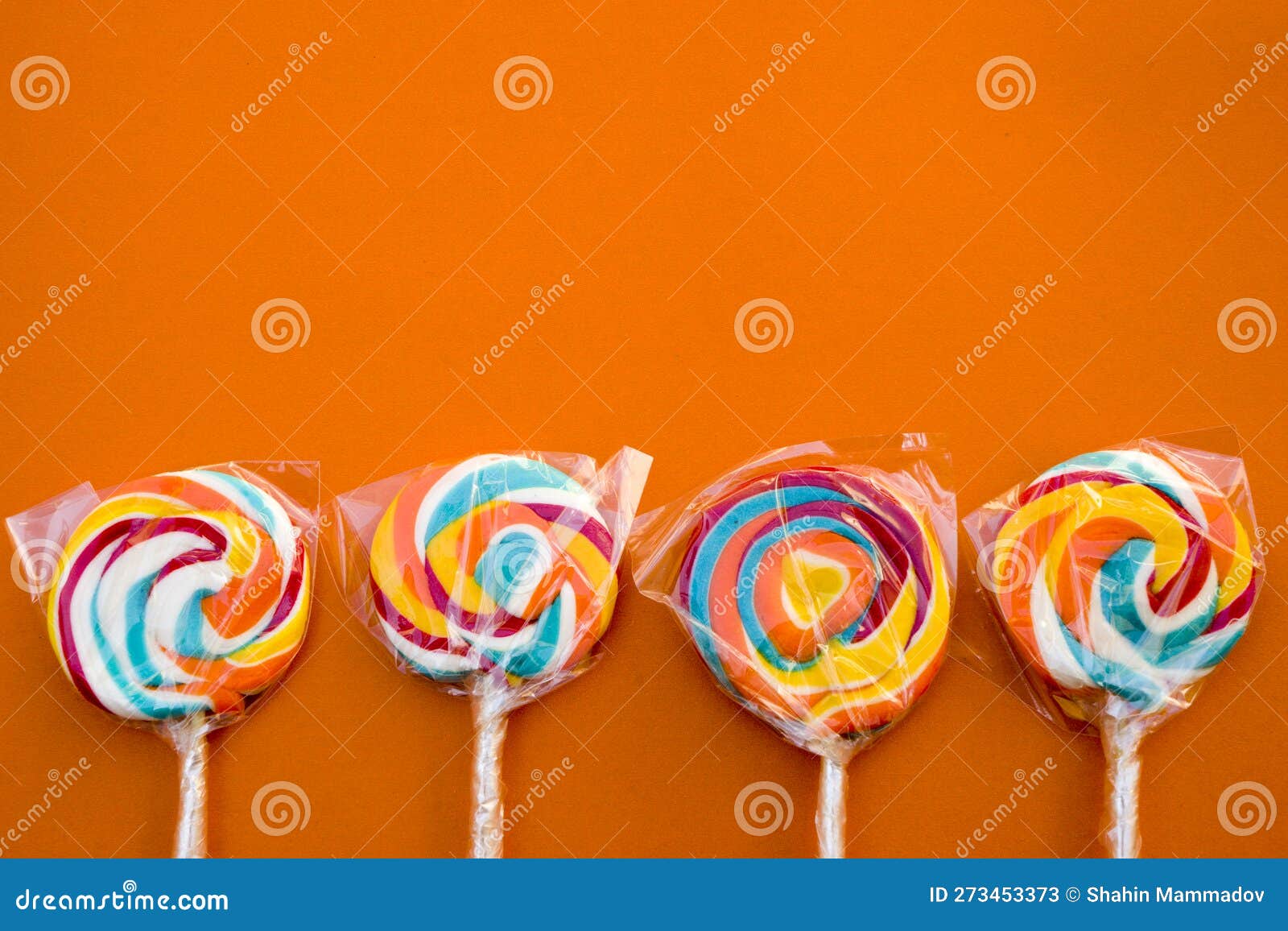 Colorful Spiral Lollipop Candy on Stick. on a Orange Background Stock Image Image of dessert