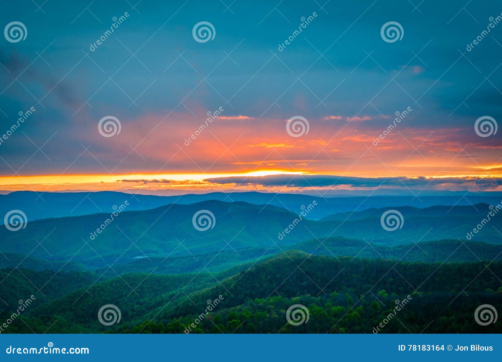 colorful spring sunset over the blue ridge mountains, seen from