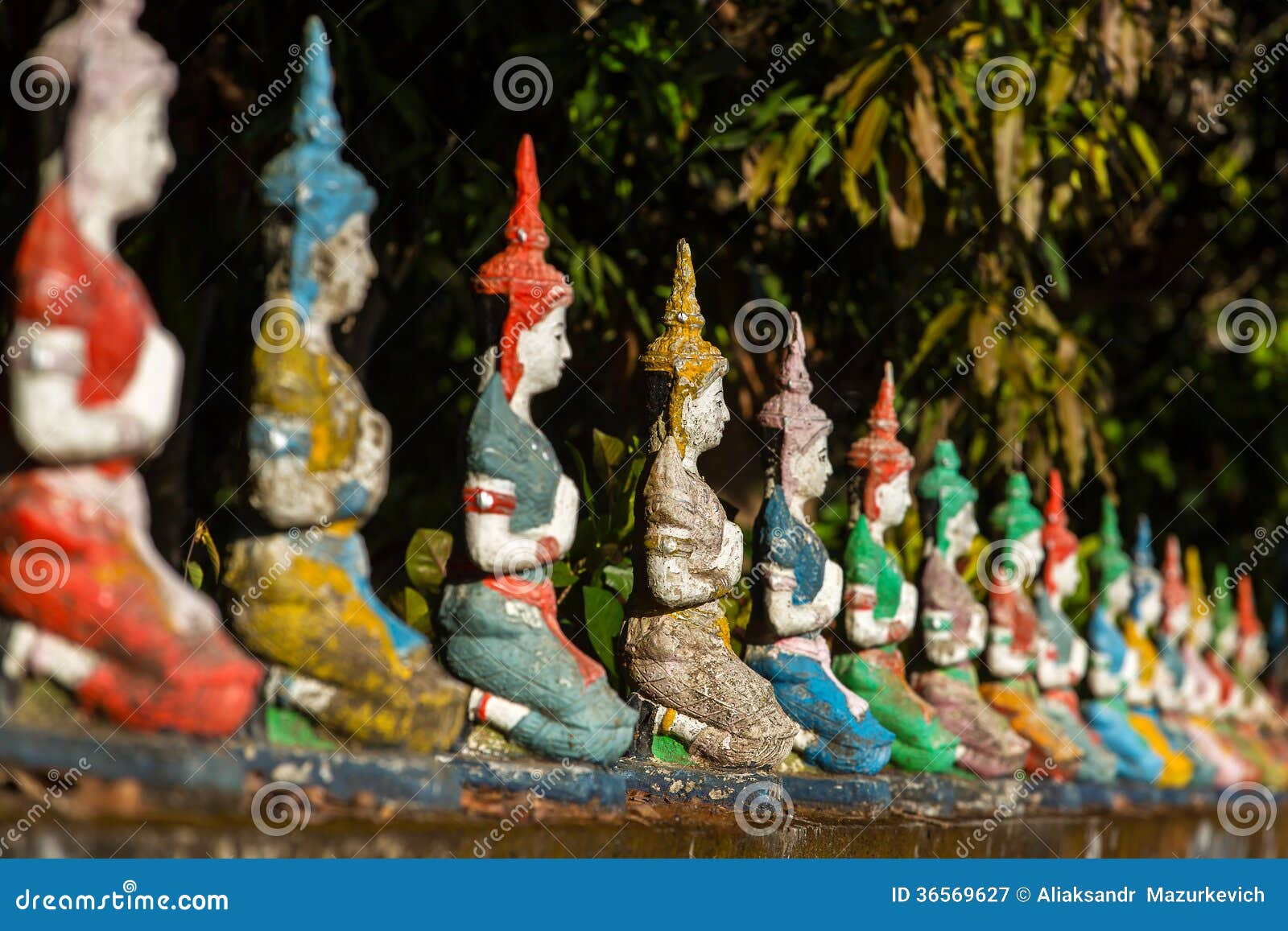 Colorful Statues on the Wall of a Buddhist Temple Stock Image Image