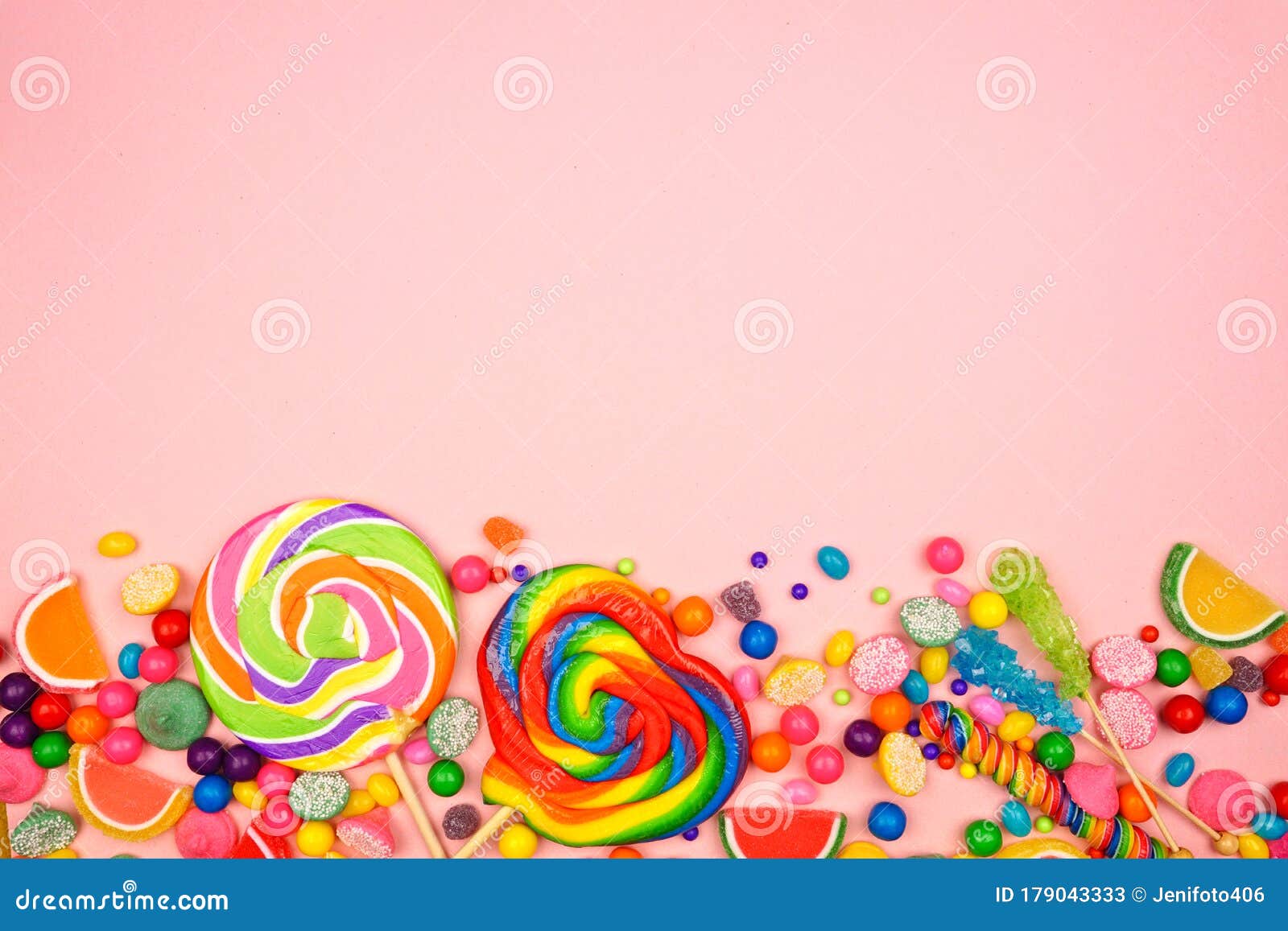 Colorful Candies, Above View Bottom Border on a Pink Background Stock ...