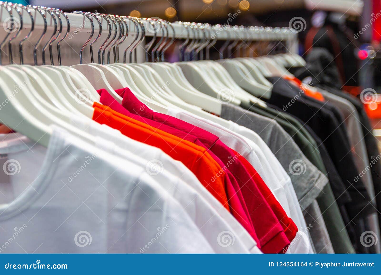 Colorful T-shirt on Hangers for Sale Stock Photo - Image of retail ...