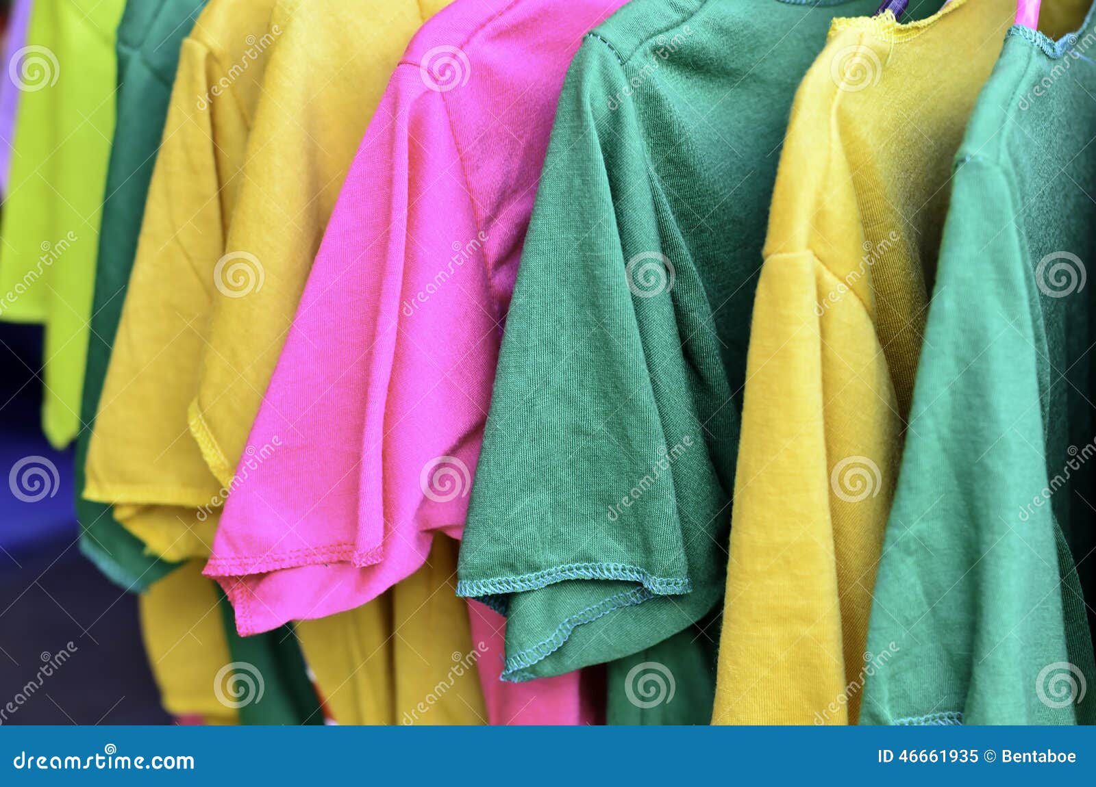 Colorful T-shirt on Hangers Stock Image - Image of fabric, hanger: 46661935