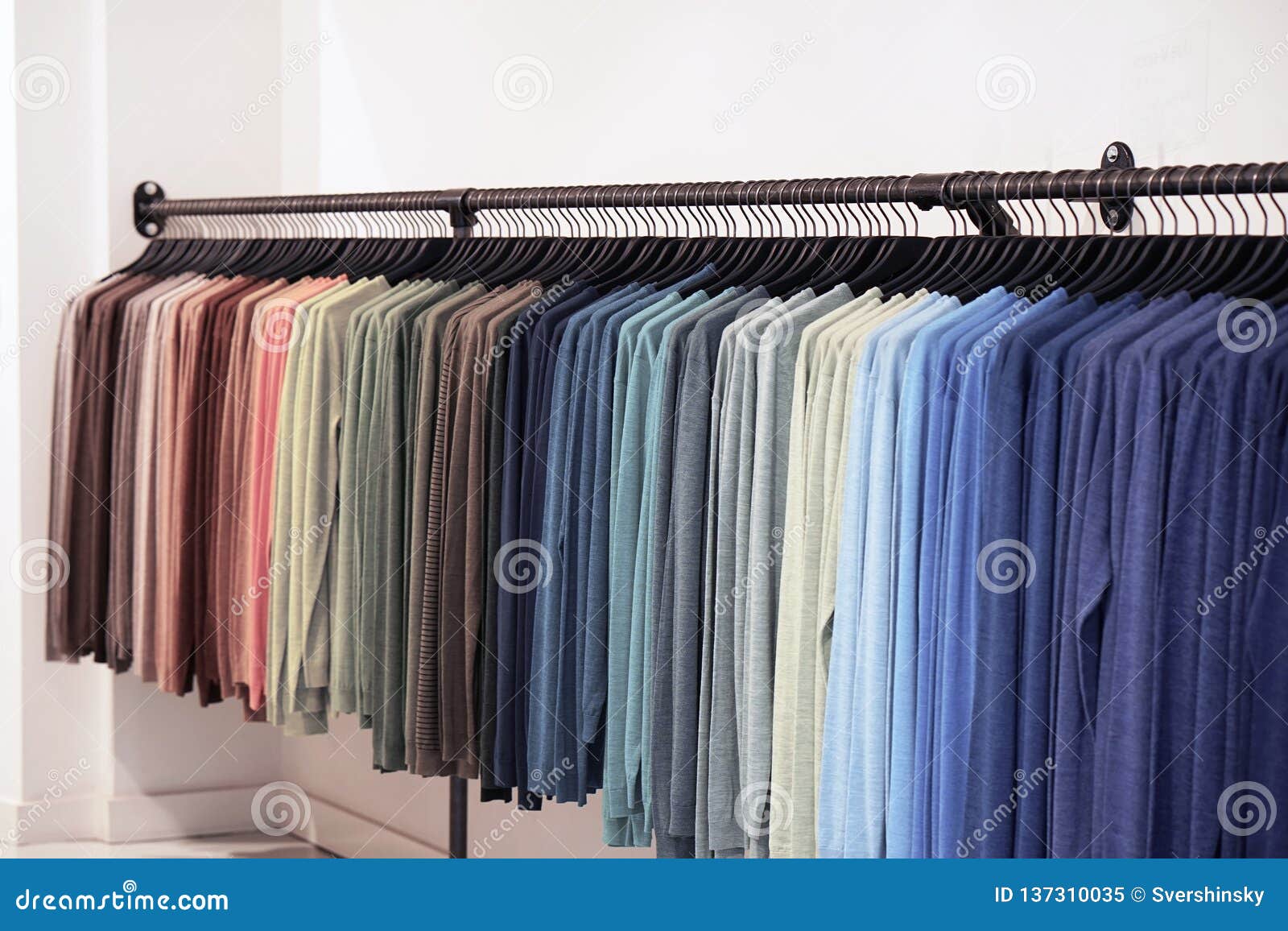 https://thumbs.dreamstime.com/z/colorful-t-shirts-hangers-clothes-hanger-shirt-fashionable-clothing-shop-sport-hanging-137310035.jpg