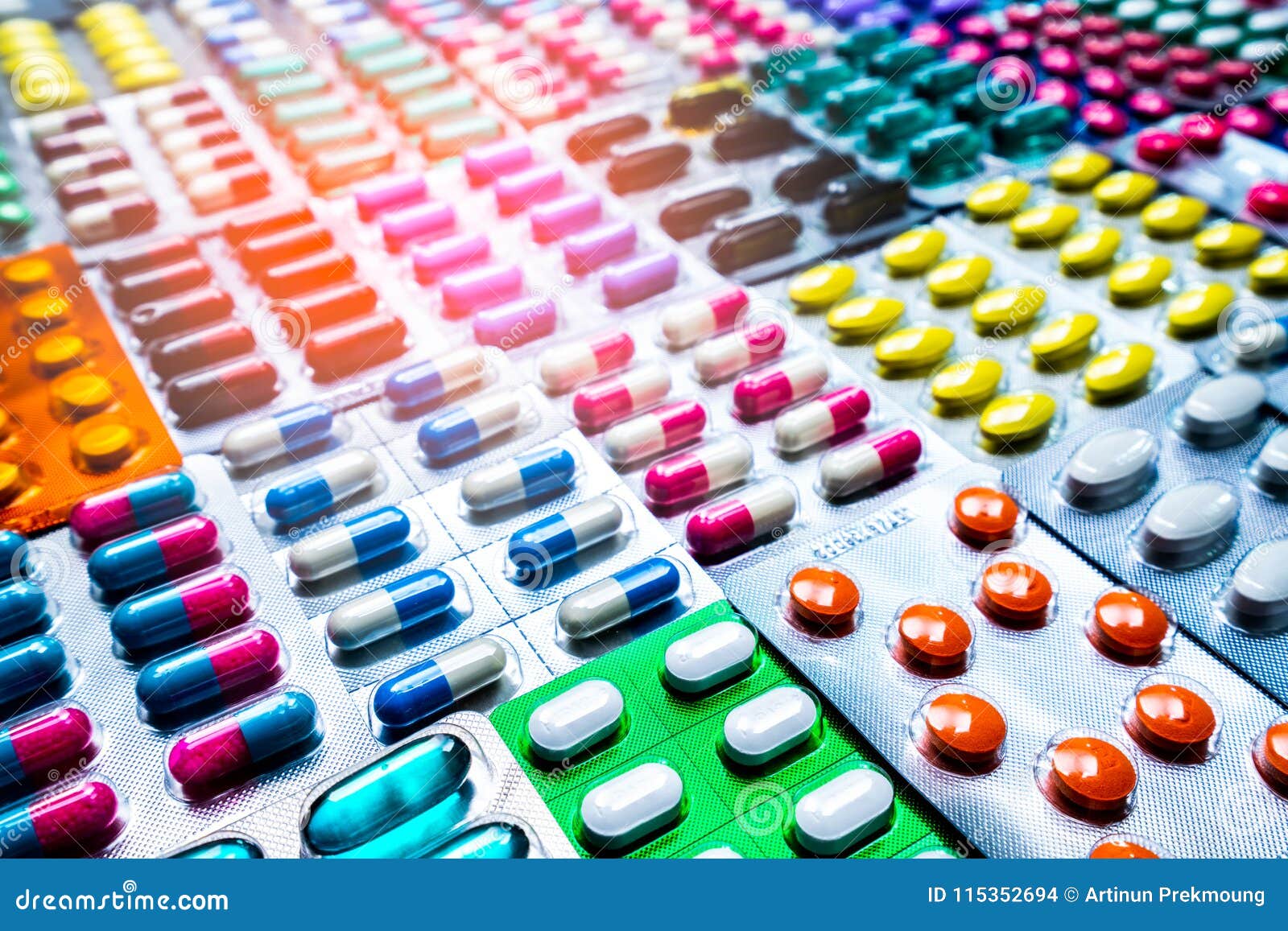 colorful of tablets and capsules pill in blister packaging arranged with beautiful pattern. pharmaceutical industry.