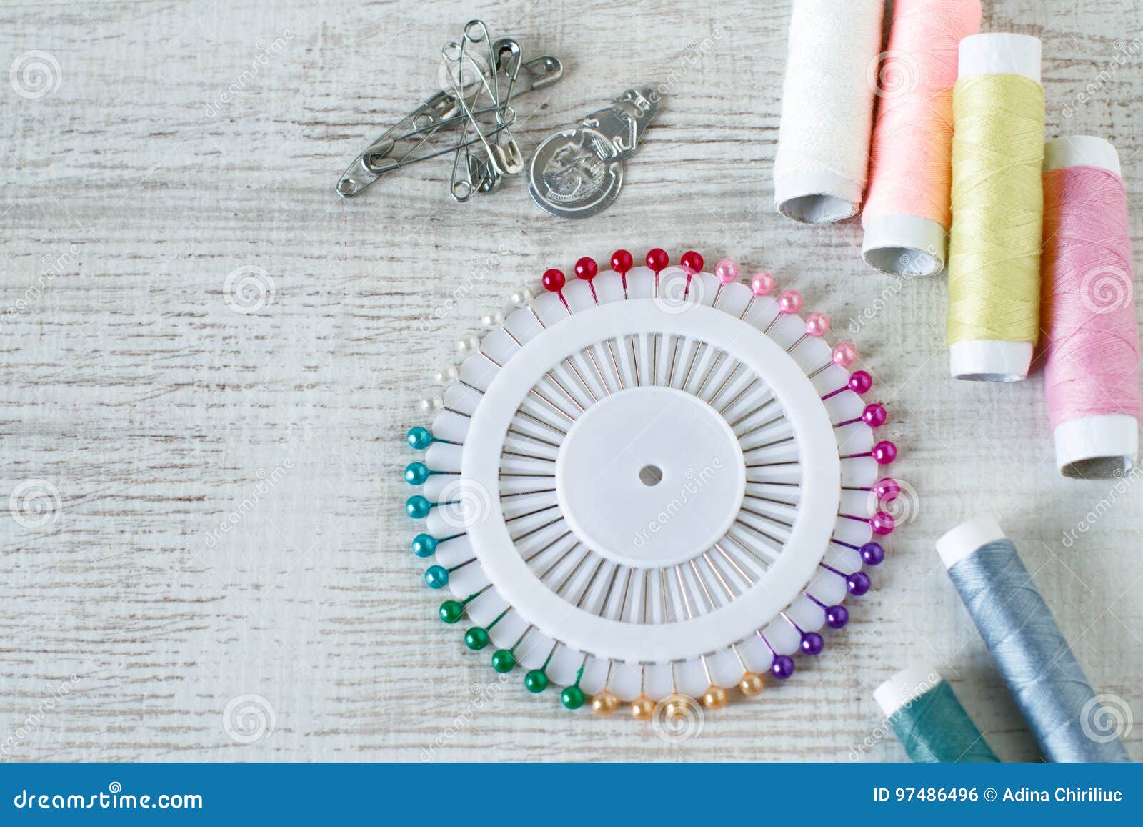 Colorful Thread Spools and Needles Stock Photo - Image of reel ...