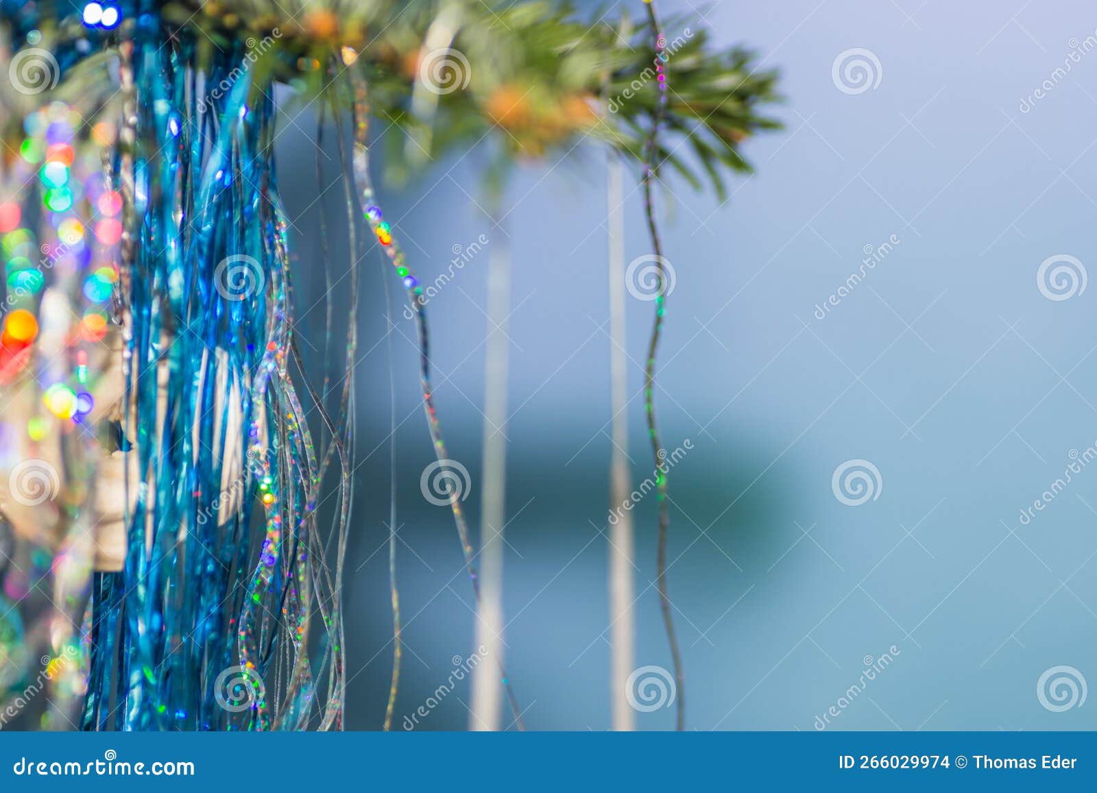 Colorful Tinsel at the Christmas Tree with Blue Stock Photo Image of