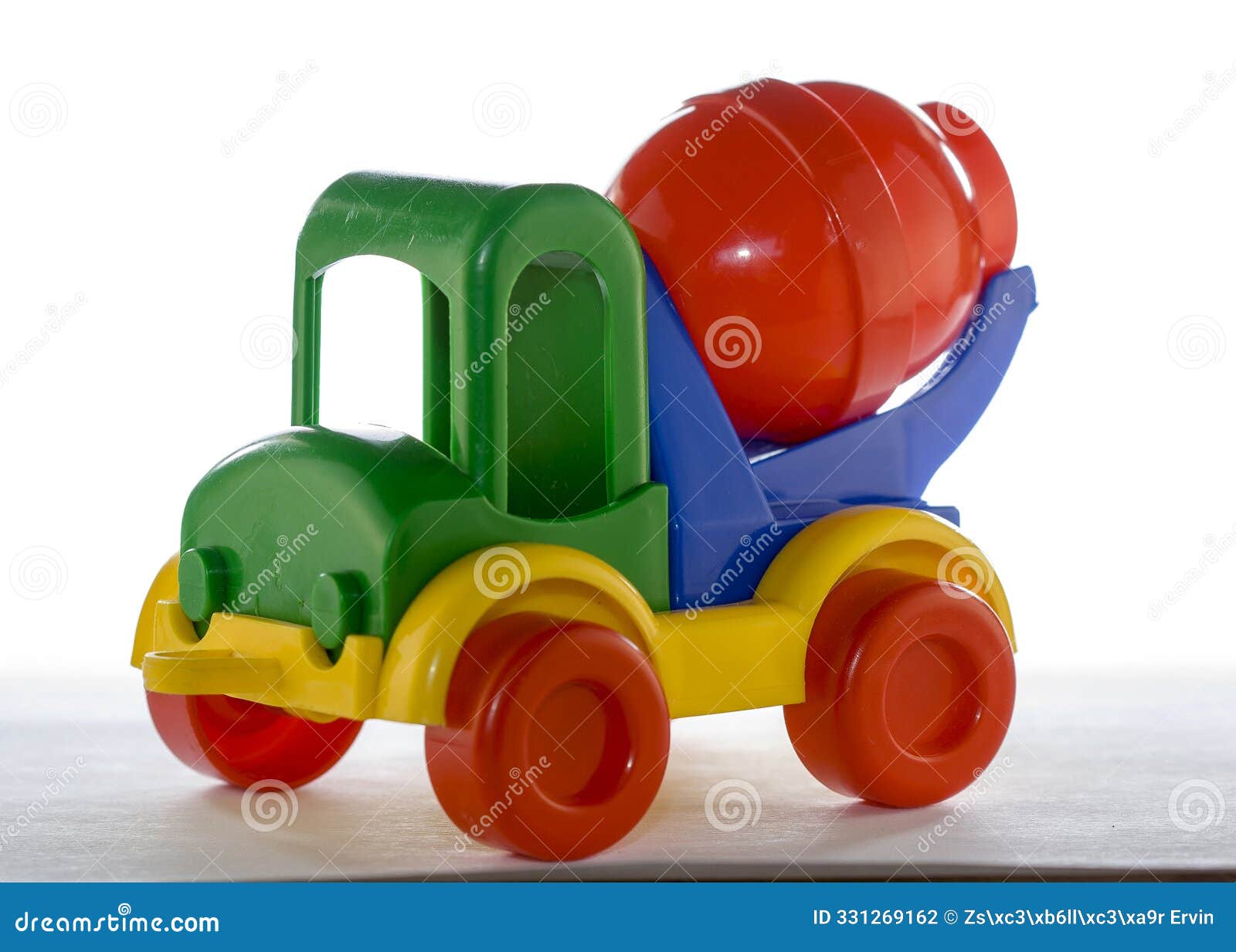 a colorful toy concrete mixer truck  on a white background.