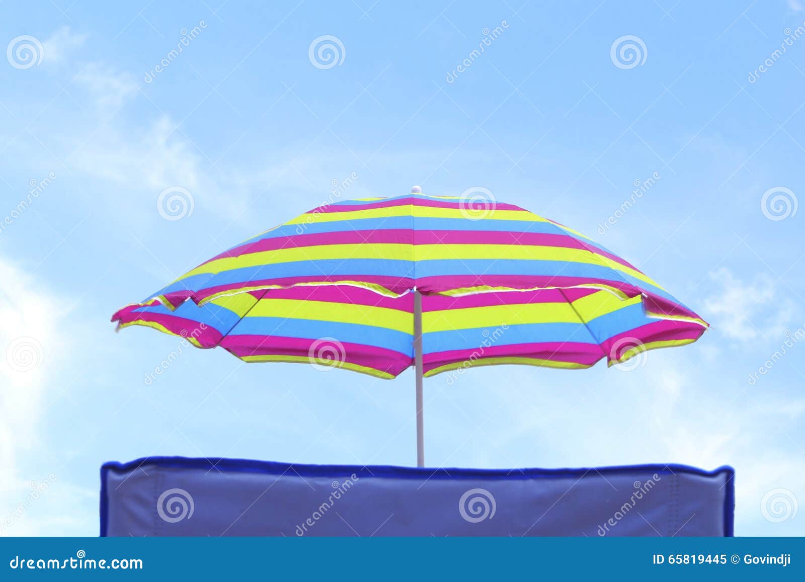 Colorful umbrella on beach stock image. Image of coast - 65819445