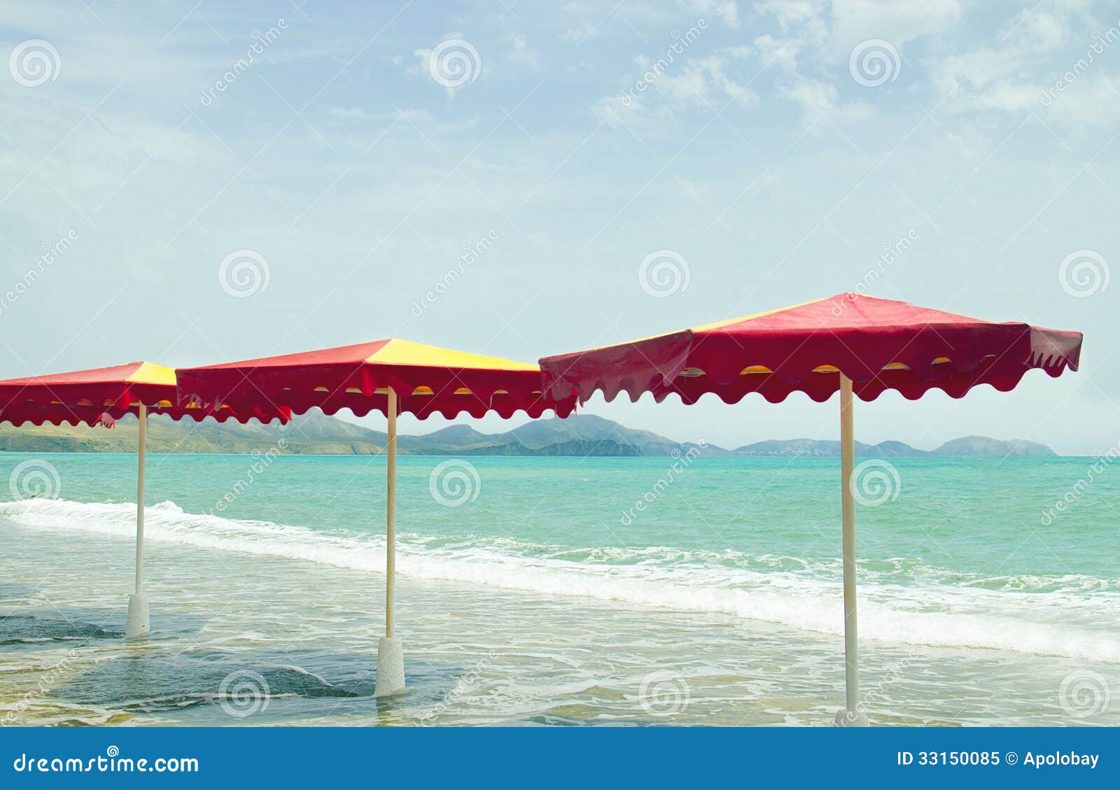 Colorful Umbrellas in the Beach, Vintage Retro Style Stock Image