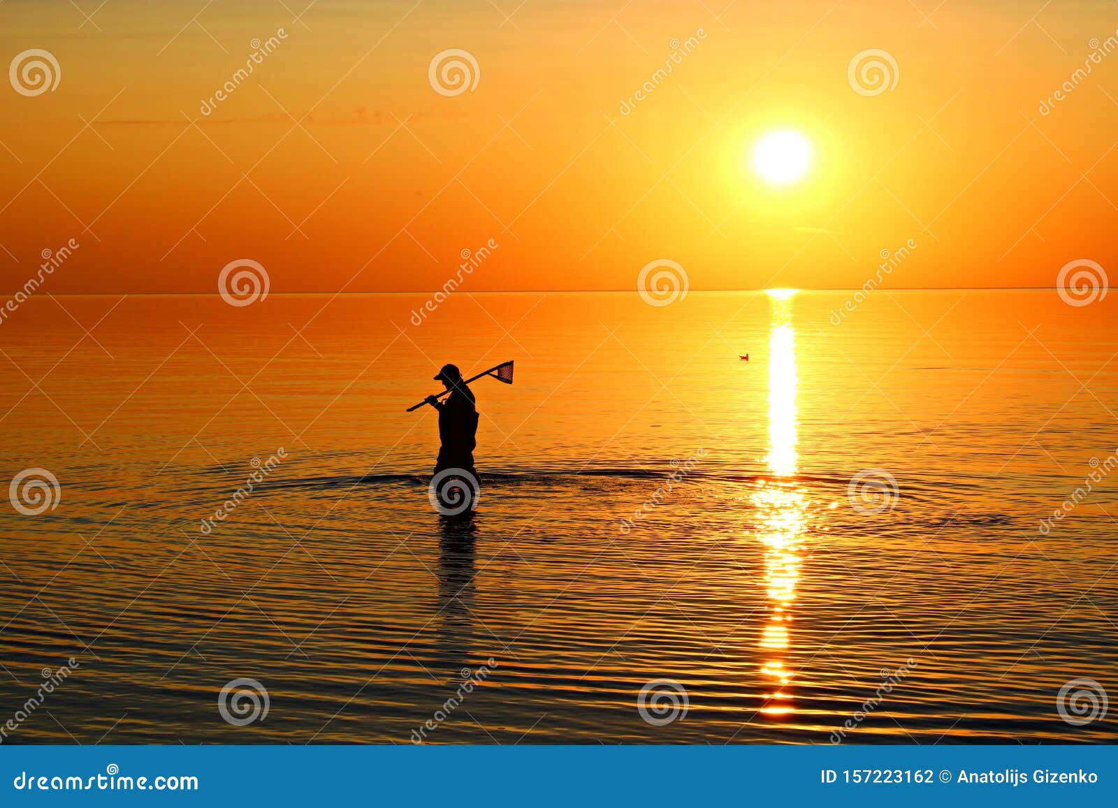 Colorful and Unusually Bright Colors Sunset in Calm Weather of the Sea