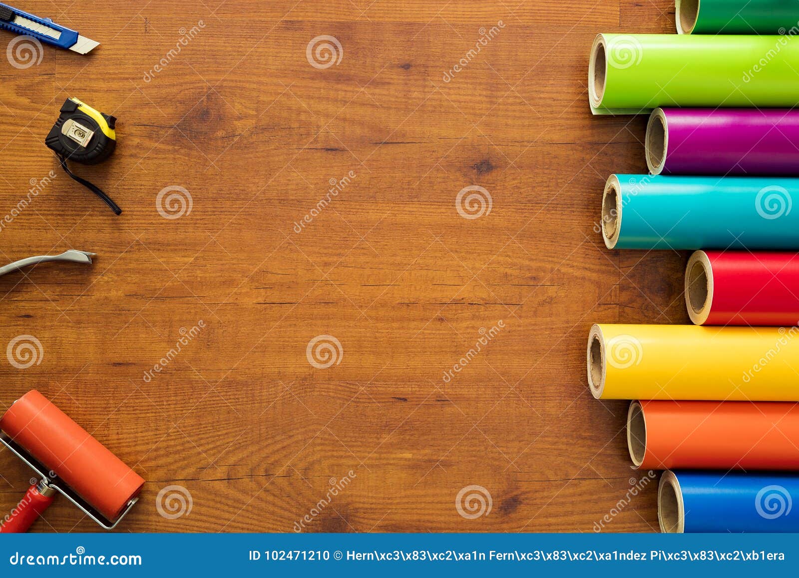 colorful vinyl rolls on wooden background