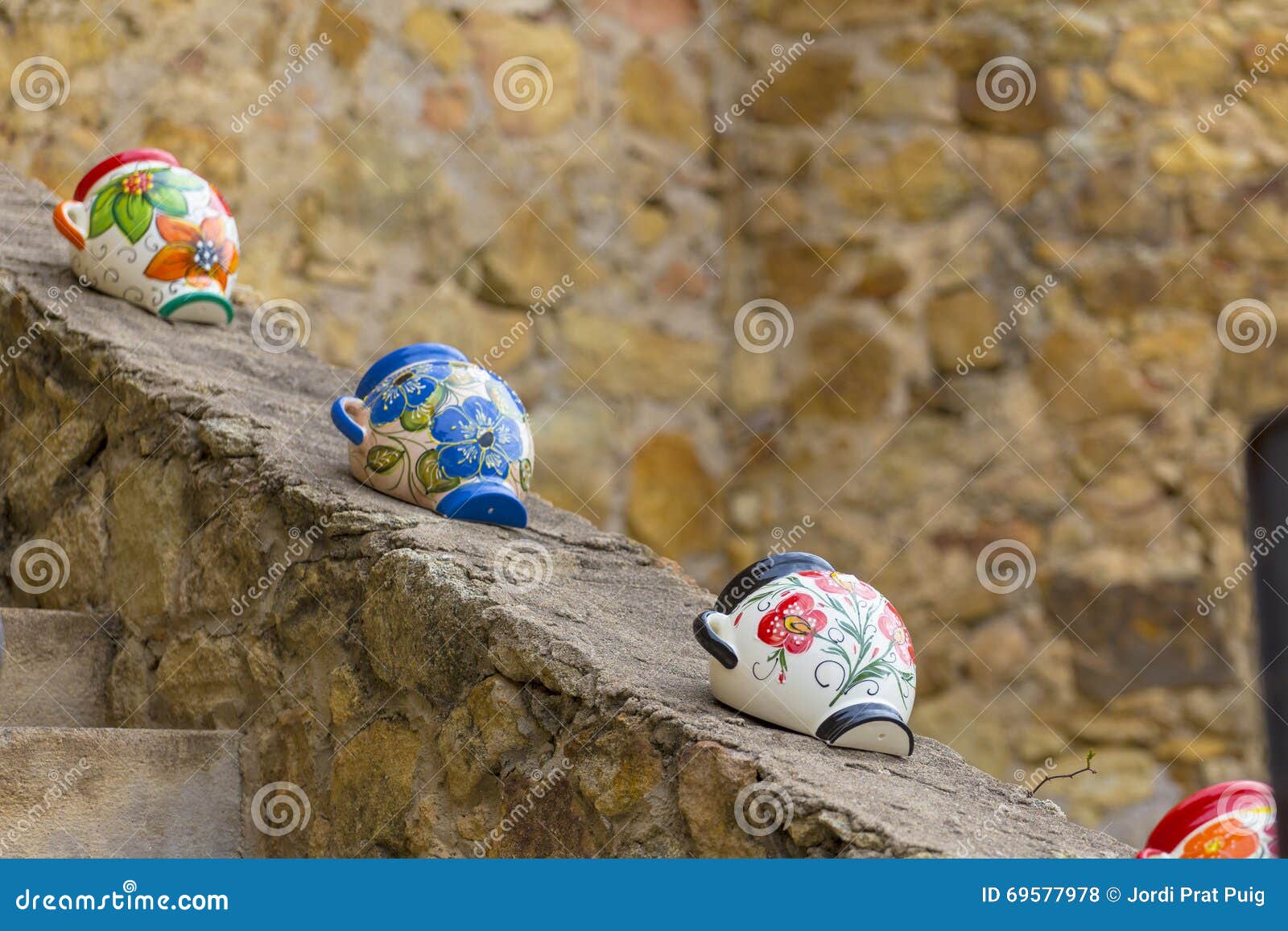 Colorful Water Pitcher in a Row on a Stone Wall Stock Photo Image of handmade, vintage 69577978