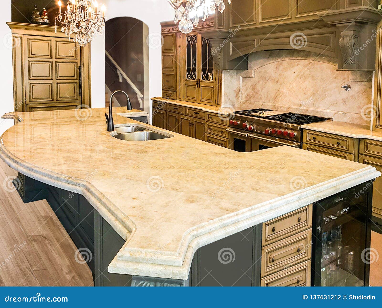 colorful wood kitchen cabinets with appliances, granite countertops and hardwood floor